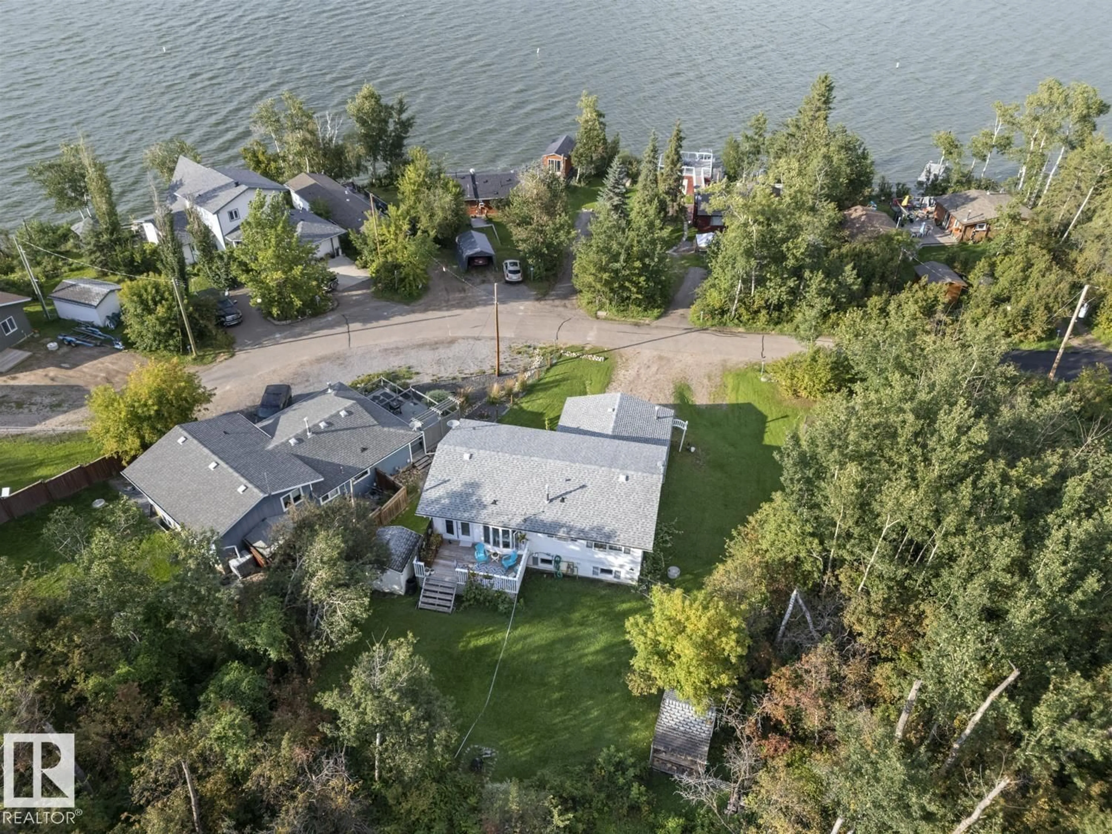 A pic from outside/outdoor area/front of a property/back of a property/a pic from drone, water/lake/river/ocean view for 315 PERCH CL, Rural Bonnyville M.D. Alberta T9N2J6