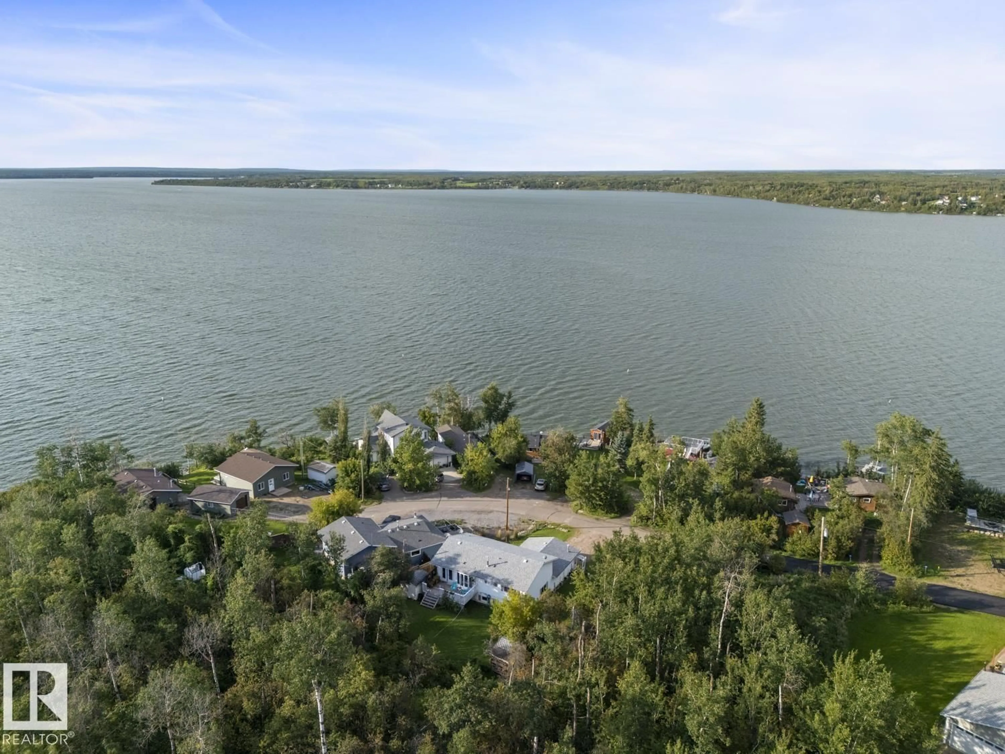 A pic from outside/outdoor area/front of a property/back of a property/a pic from drone, water/lake/river/ocean view for 315 PERCH CL, Rural Bonnyville M.D. Alberta T9N2J6