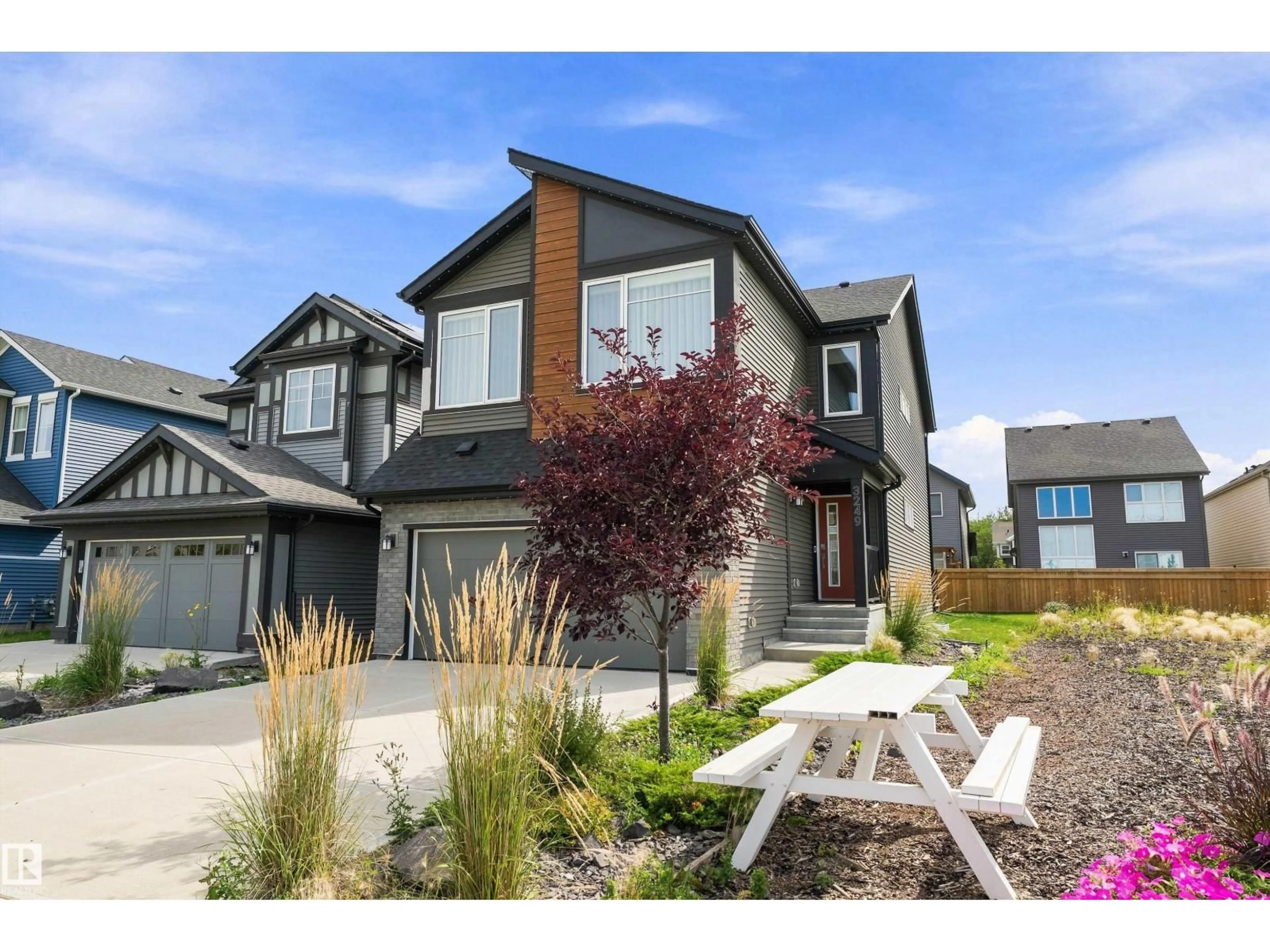 Home with vinyl exterior material, street for 3249 DIXON WY, Edmonton Alberta T6W5K9