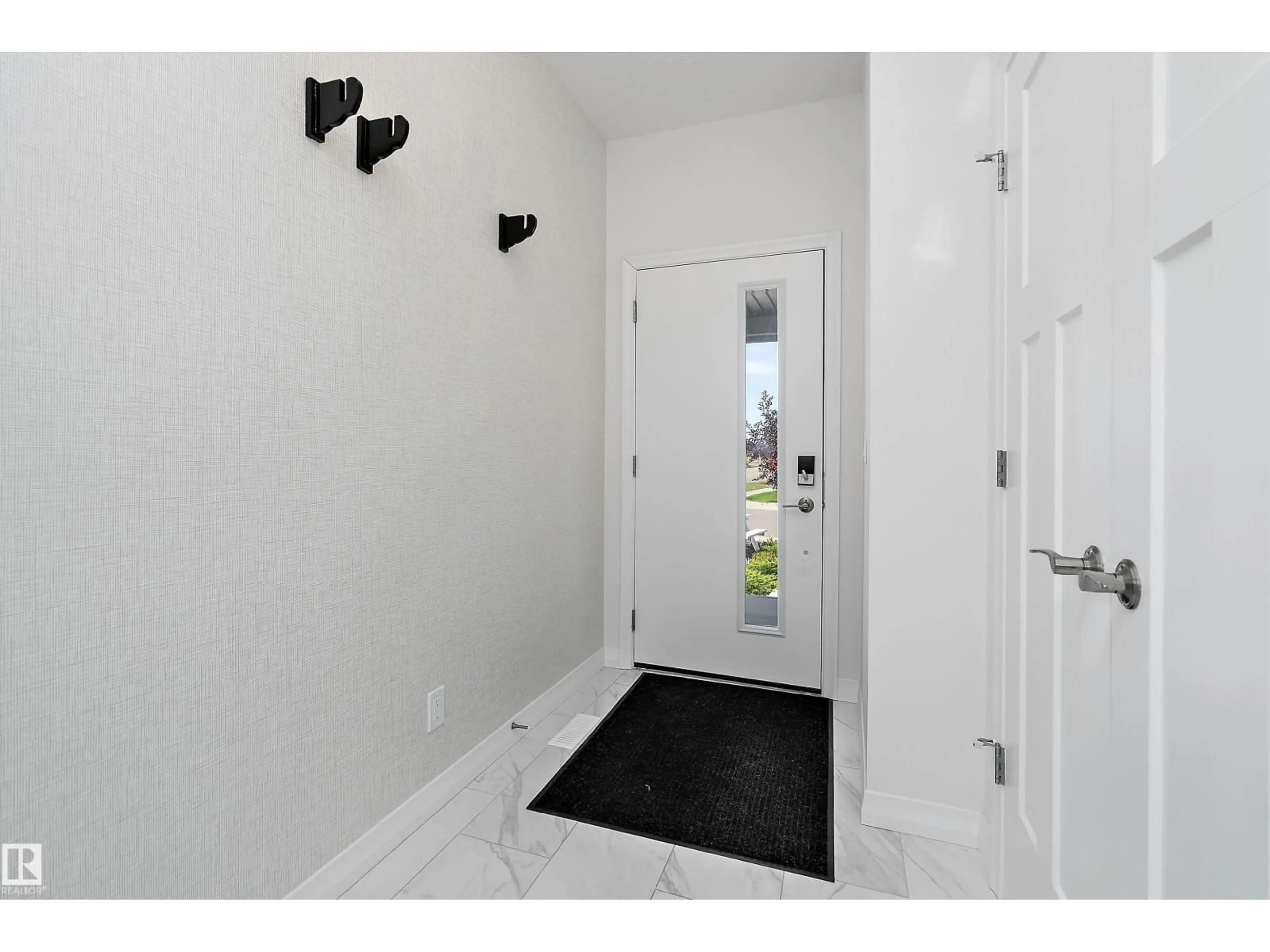 Indoor entryway for 3249 DIXON WY, Edmonton Alberta T6W5K9