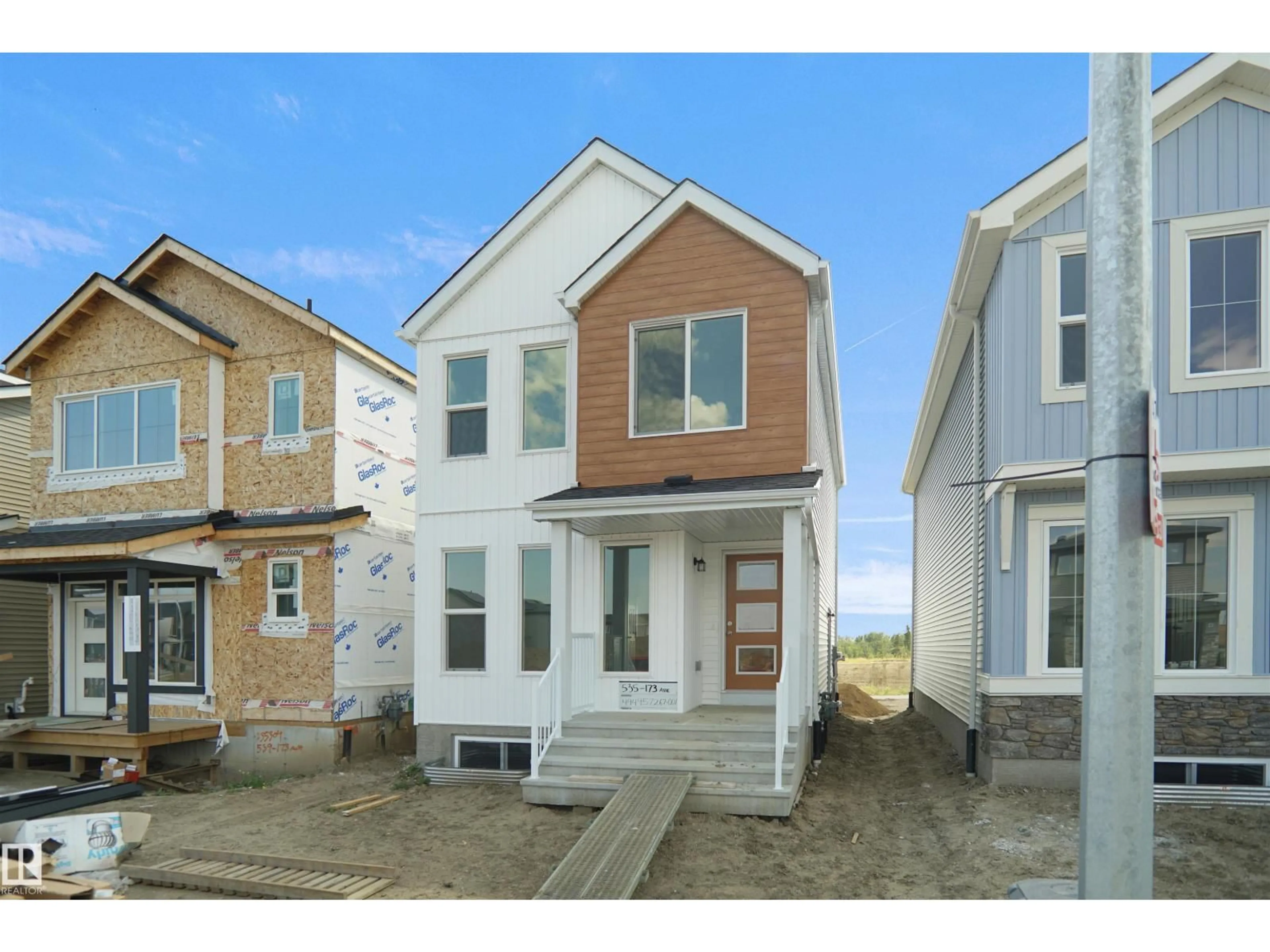 Home with vinyl exterior material, street for NE - 583 177 AV, Edmonton Alberta T5Y4K3