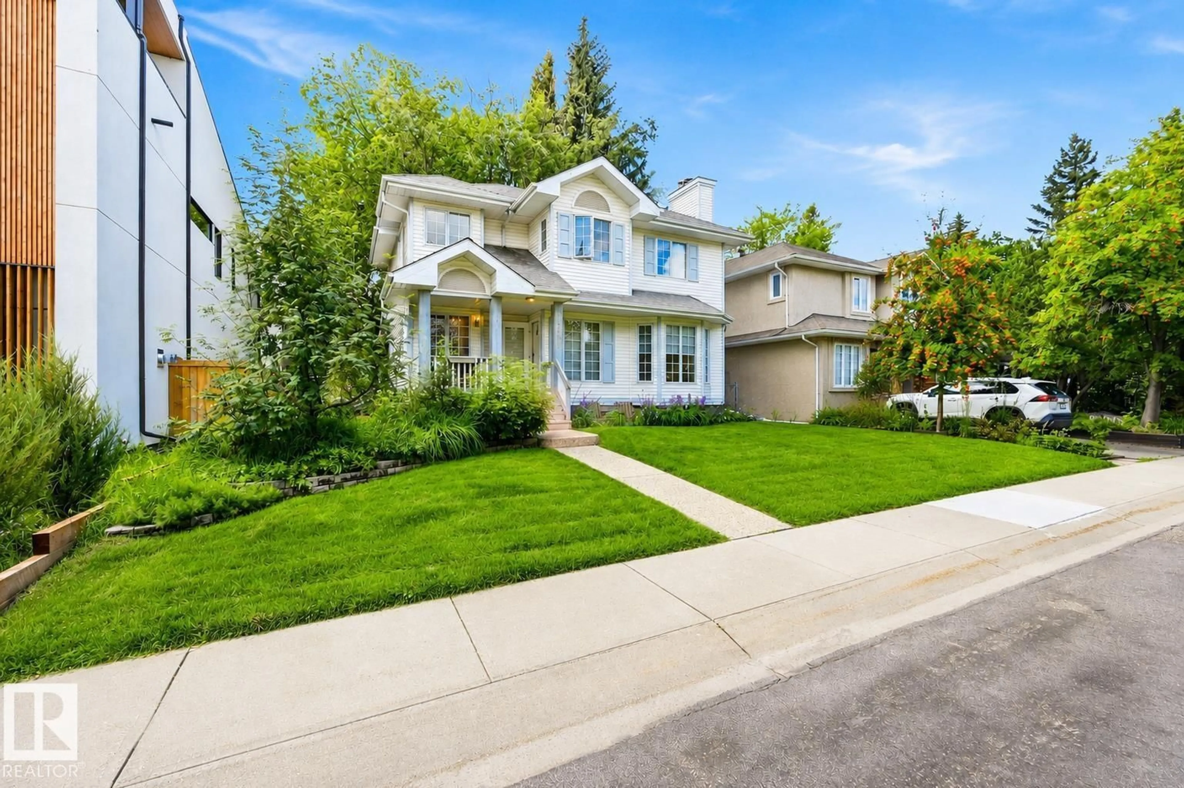 Home with vinyl exterior material, street for 14631 SUMMIT DR, Edmonton Alberta T5N3T4
