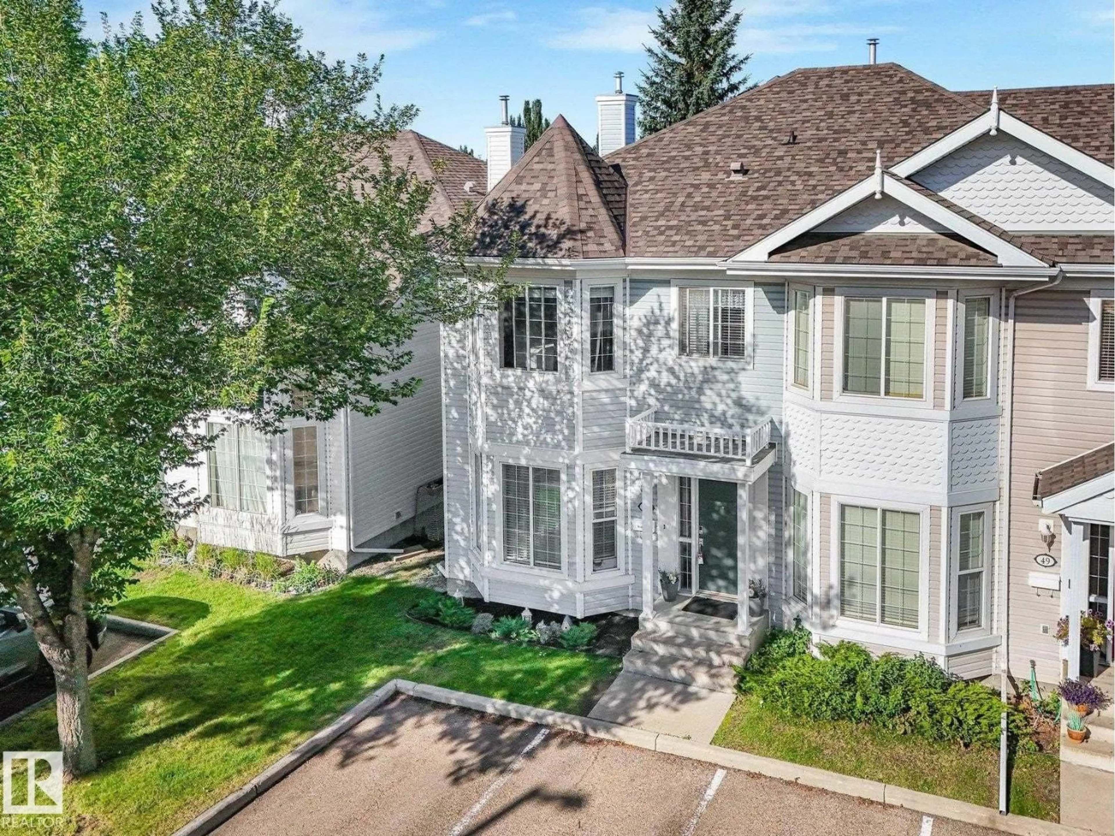 A pic from outside/outdoor area/front of a property/back of a property/a pic from drone, mountain view for 1780 - 48 GLASTONBURY BV, Edmonton Alberta T5T6P9