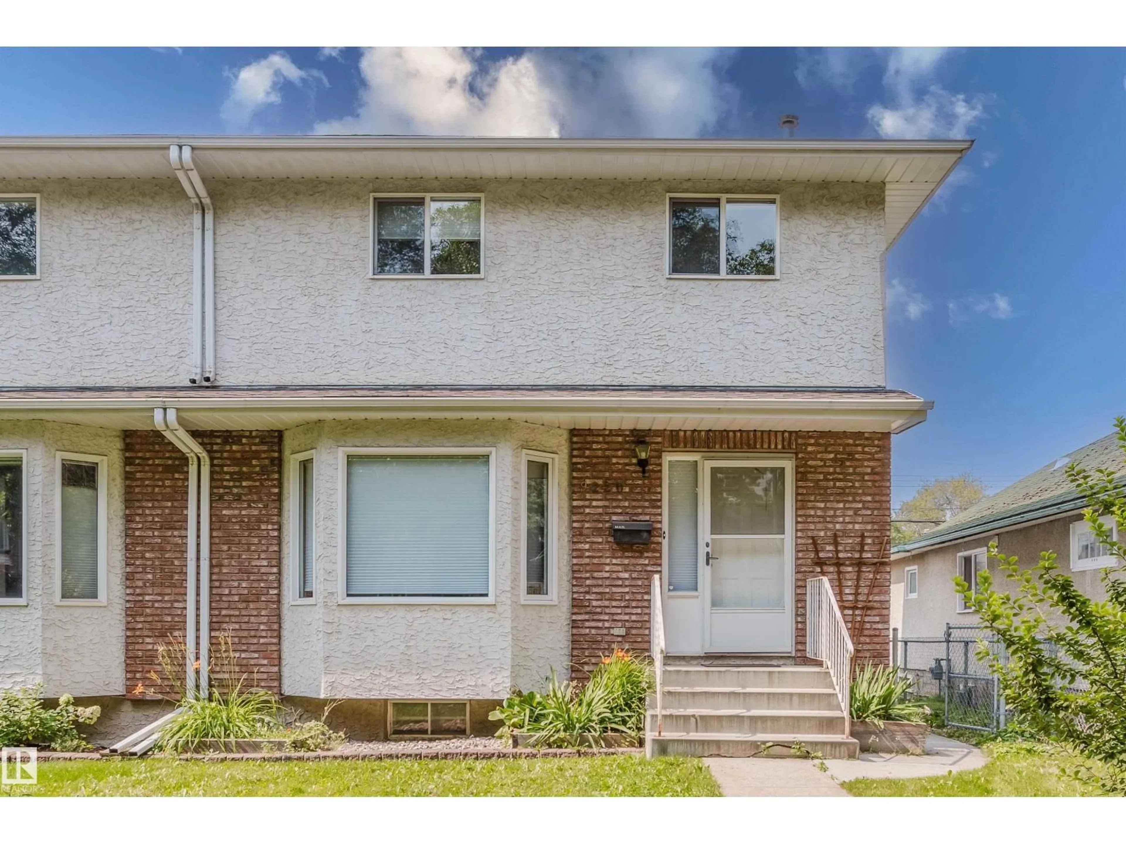 Home with brick exterior material, street for 9220 92 ST, Edmonton Alberta T6C3R5