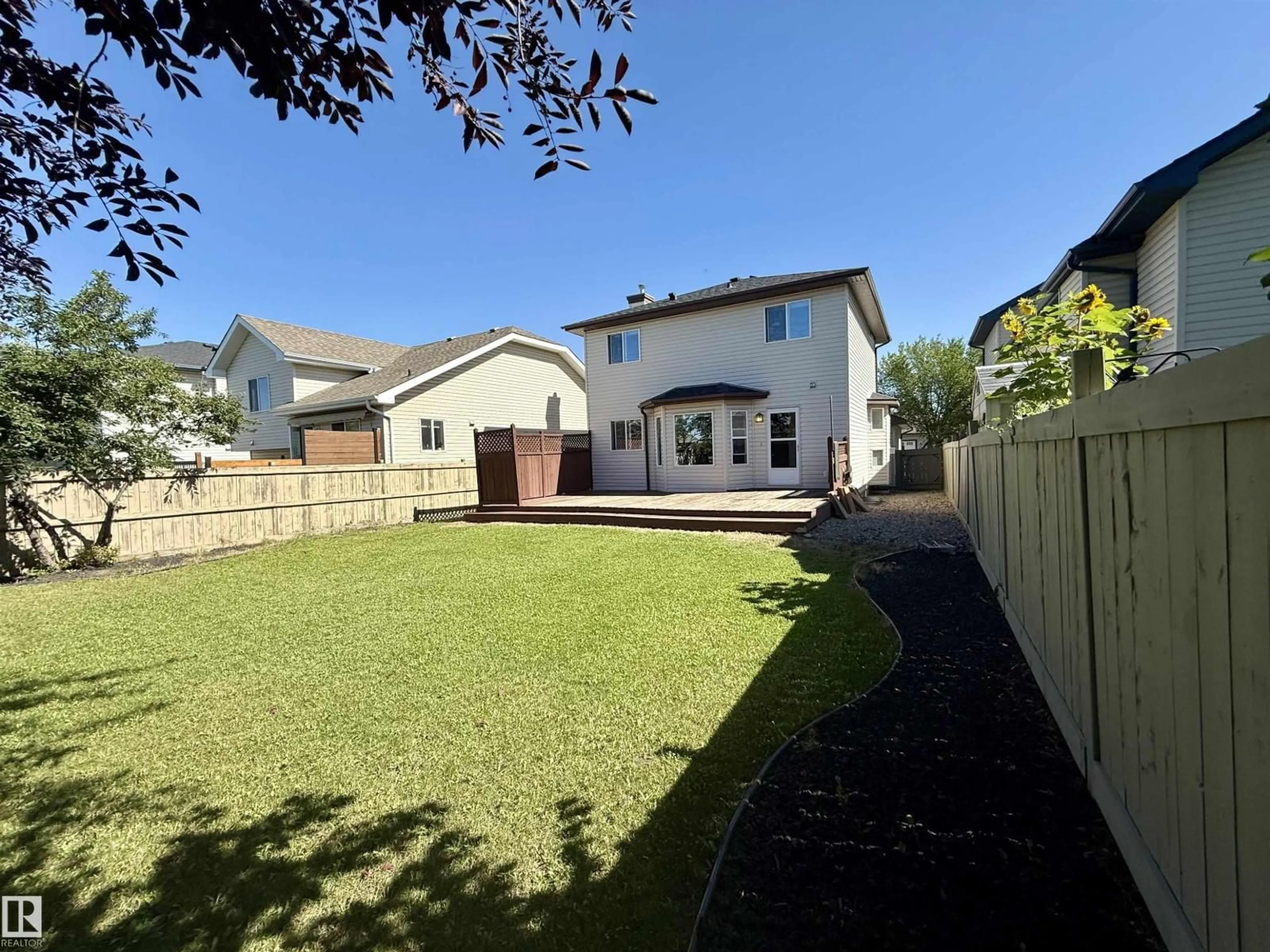 A pic from outside/outdoor area/front of a property/back of a property/a pic from drone, street for 76 BONIN CR, Beaumont Alberta T4X1R9
