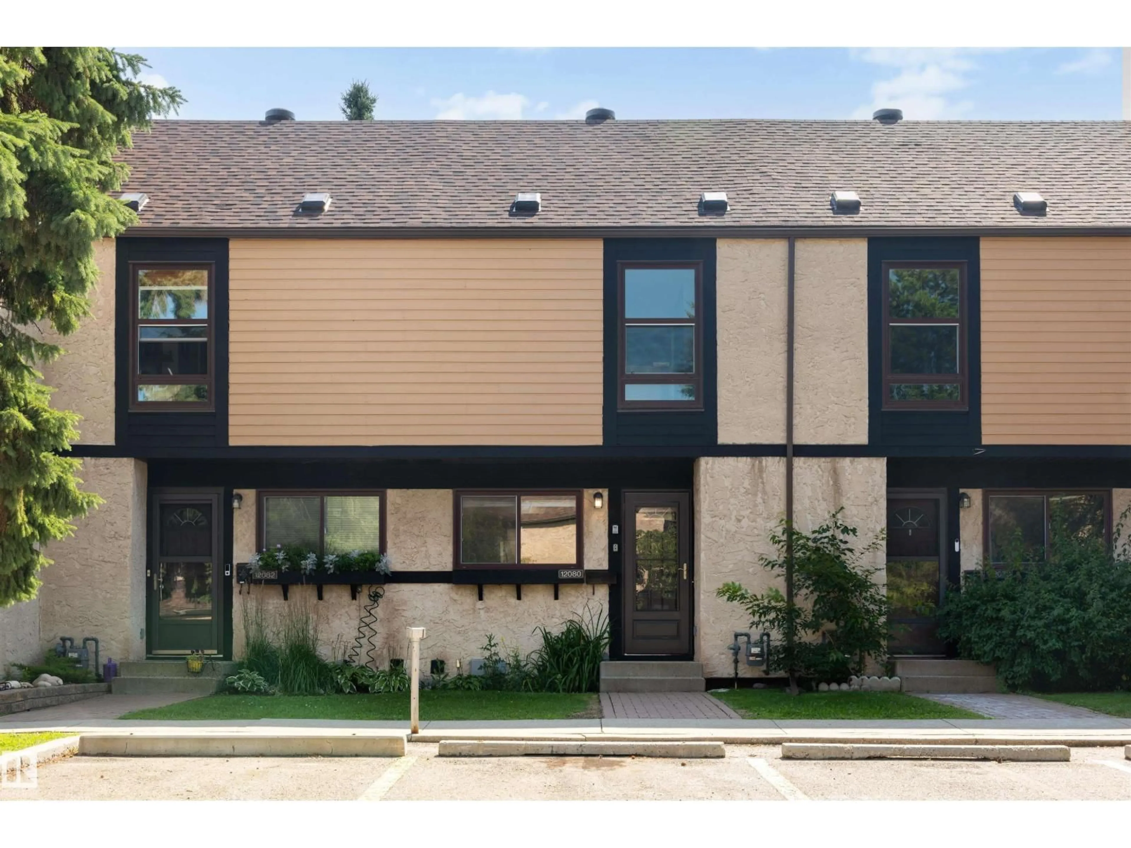 Home with vinyl exterior material, street for NW - 12080 25 AV, Edmonton Alberta T6J4L3