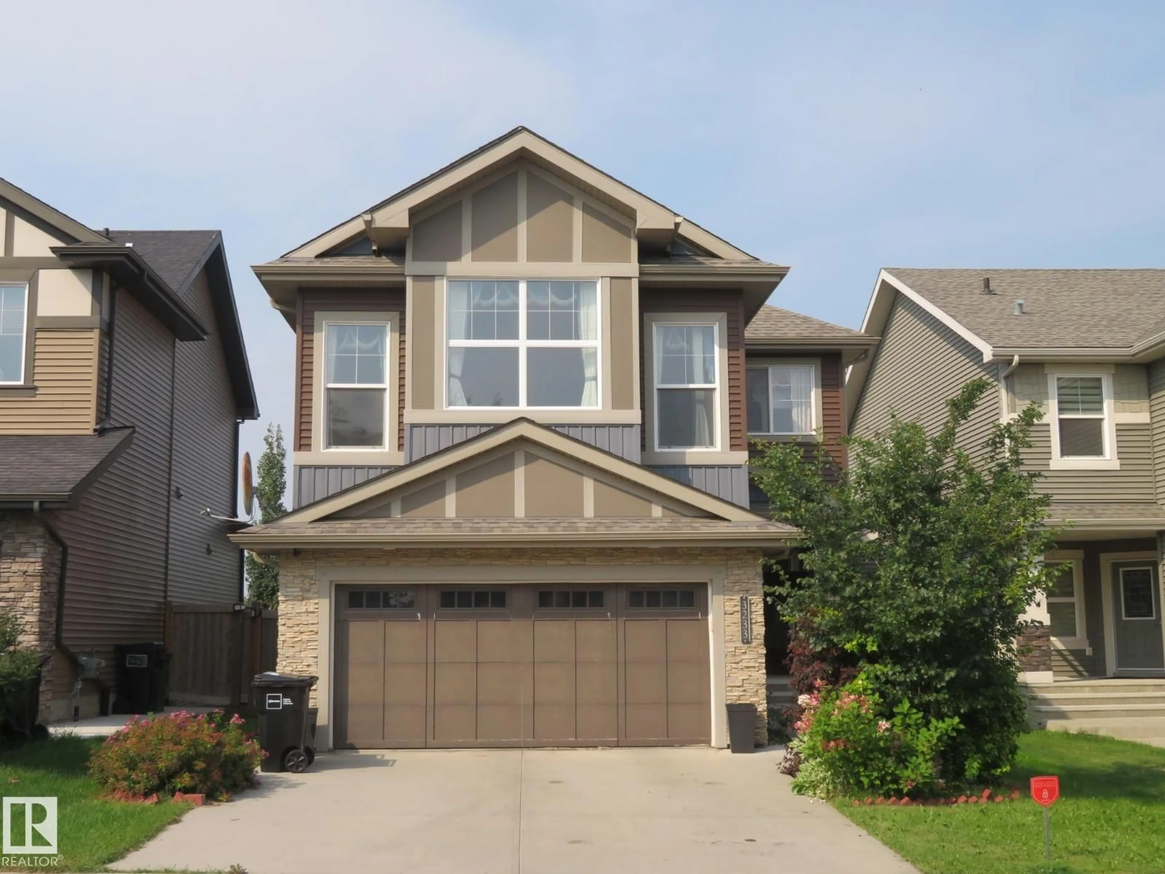 Home with vinyl exterior material, street for SW - 3233 WINSPEAR CR, Edmonton Alberta T6X1S7
