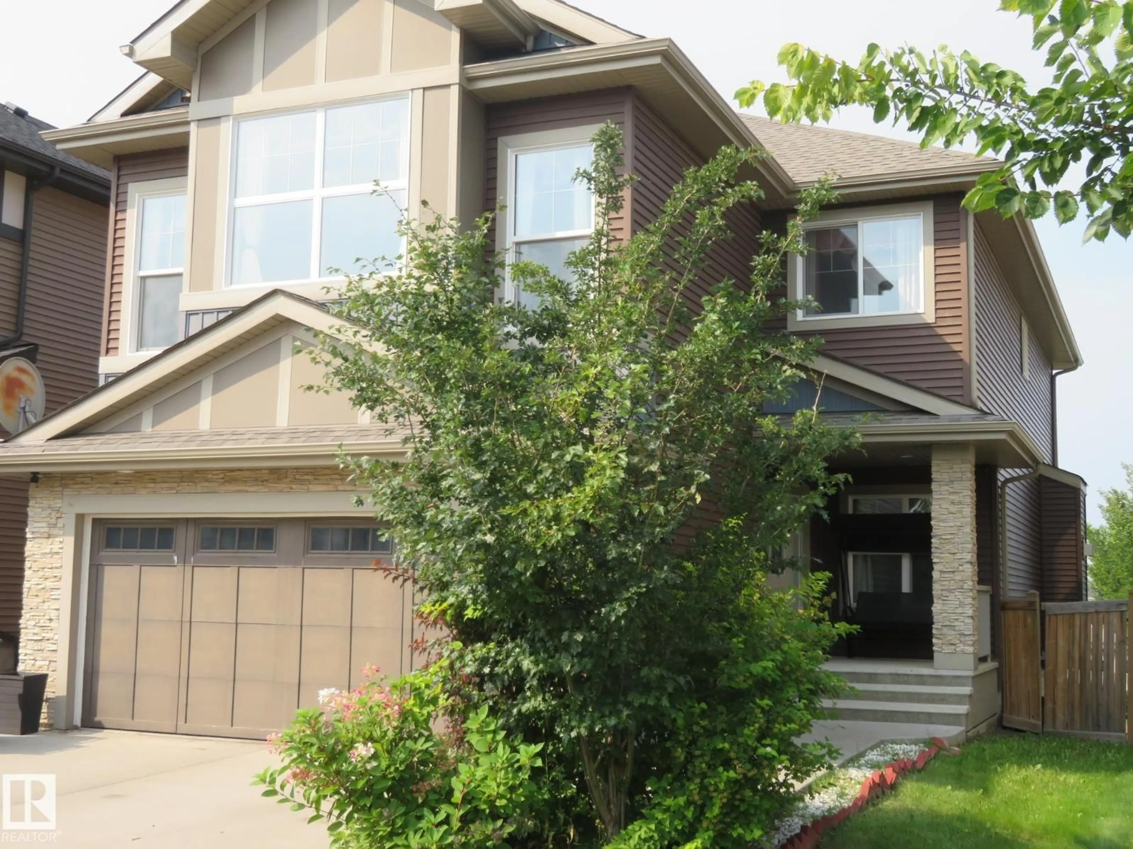 Home with brick exterior material, street for SW - 3233 WINSPEAR CR, Edmonton Alberta T6X1S7