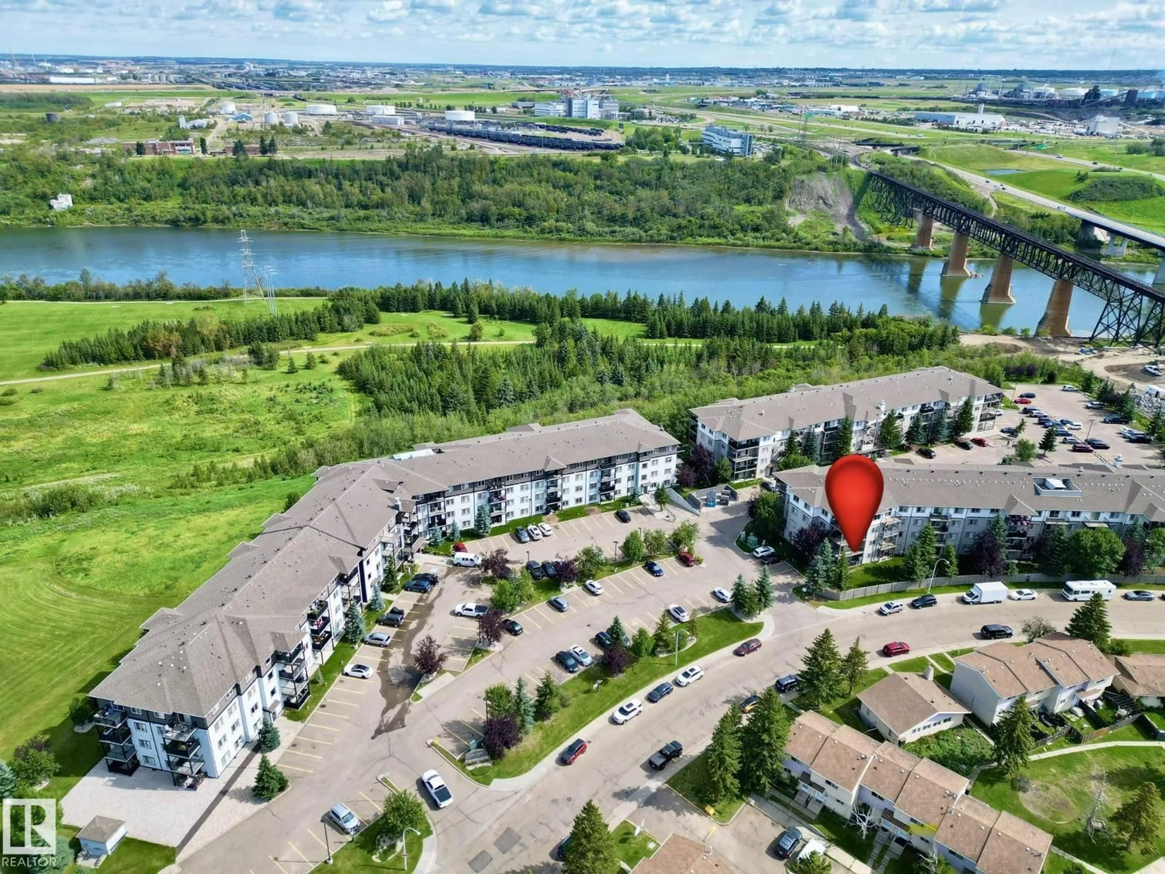 A pic from outside/outdoor area/front of a property/back of a property/a pic from drone, water/lake/river/ocean view for 1180 - 240 HYNDMAN RD, Edmonton Alberta T5A0P8