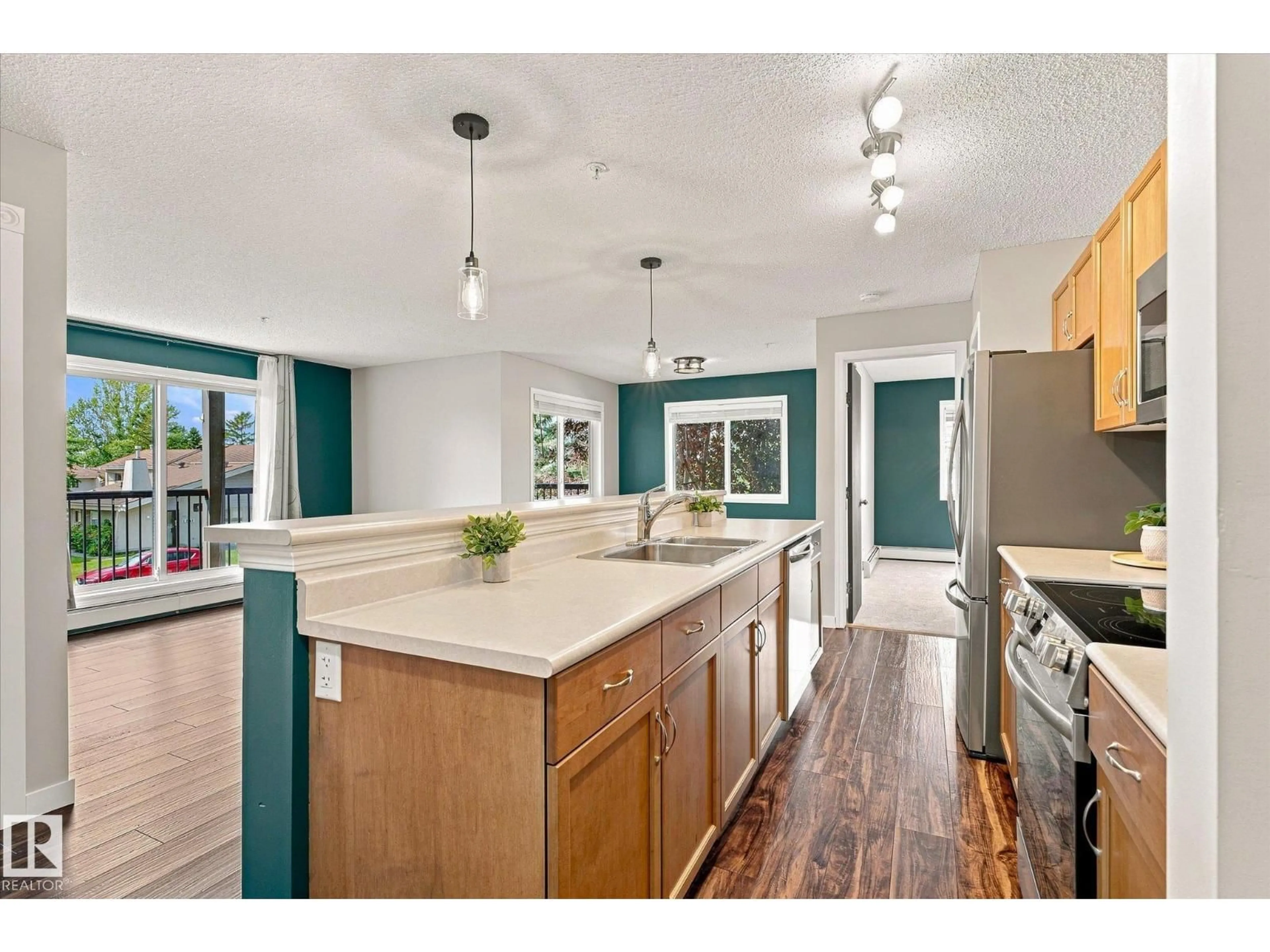 Open concept kitchen, unknown for 1180 - 240 HYNDMAN RD, Edmonton Alberta T5A0P8