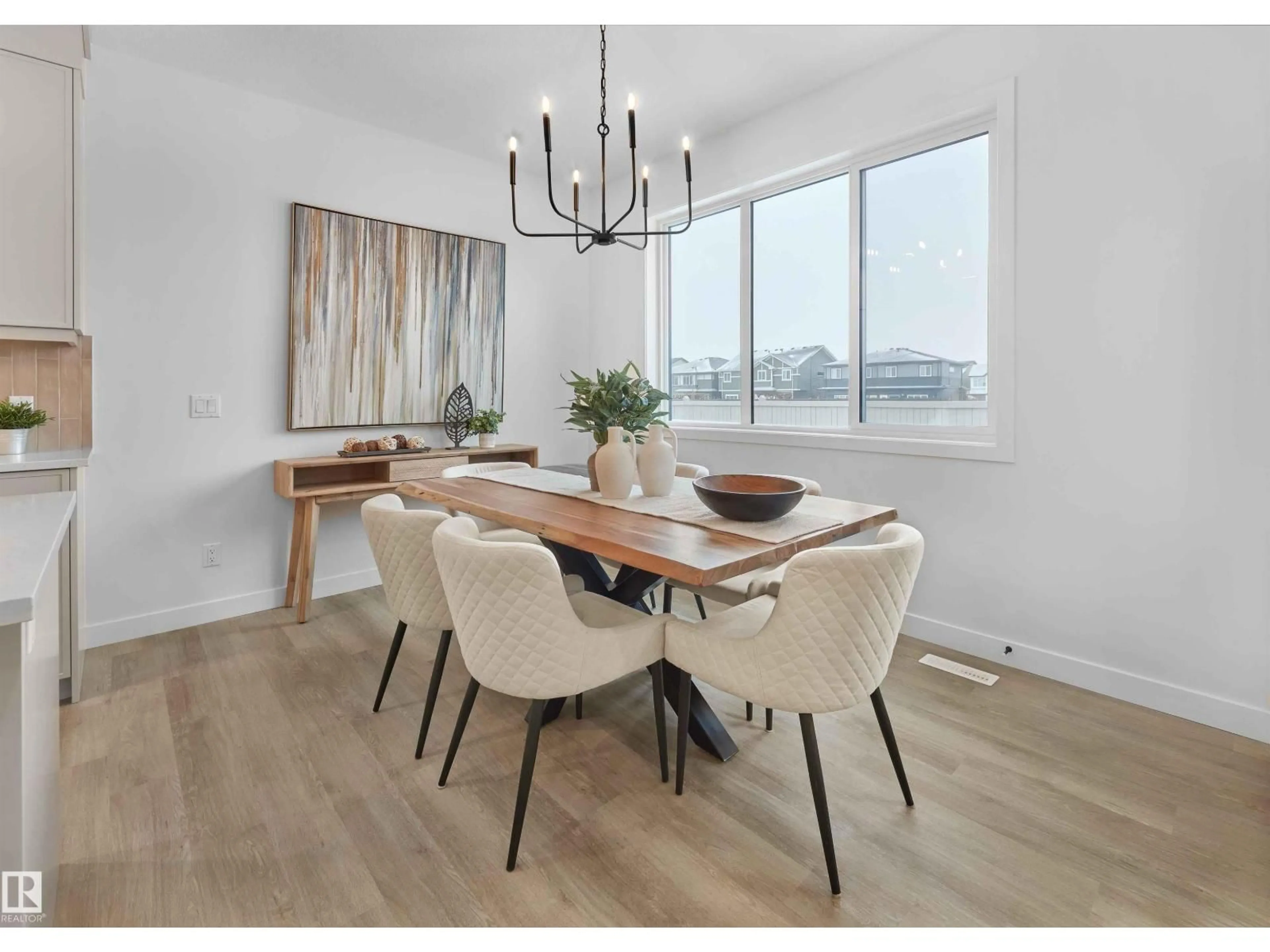 Dining room, wood/laminate floor for SW - 12532 34 AV, Edmonton Alberta T6W5Z8