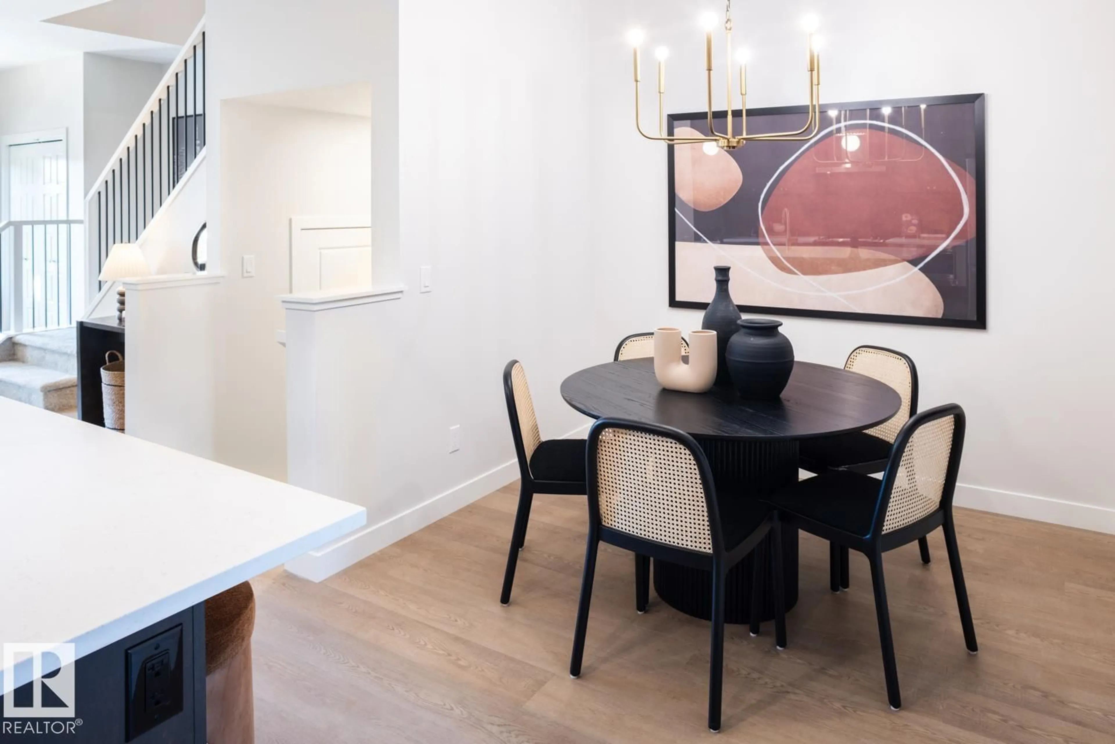 Dining room, wood/laminate floor for SW - 12531 34 AV, Edmonton Alberta T6W5Z8