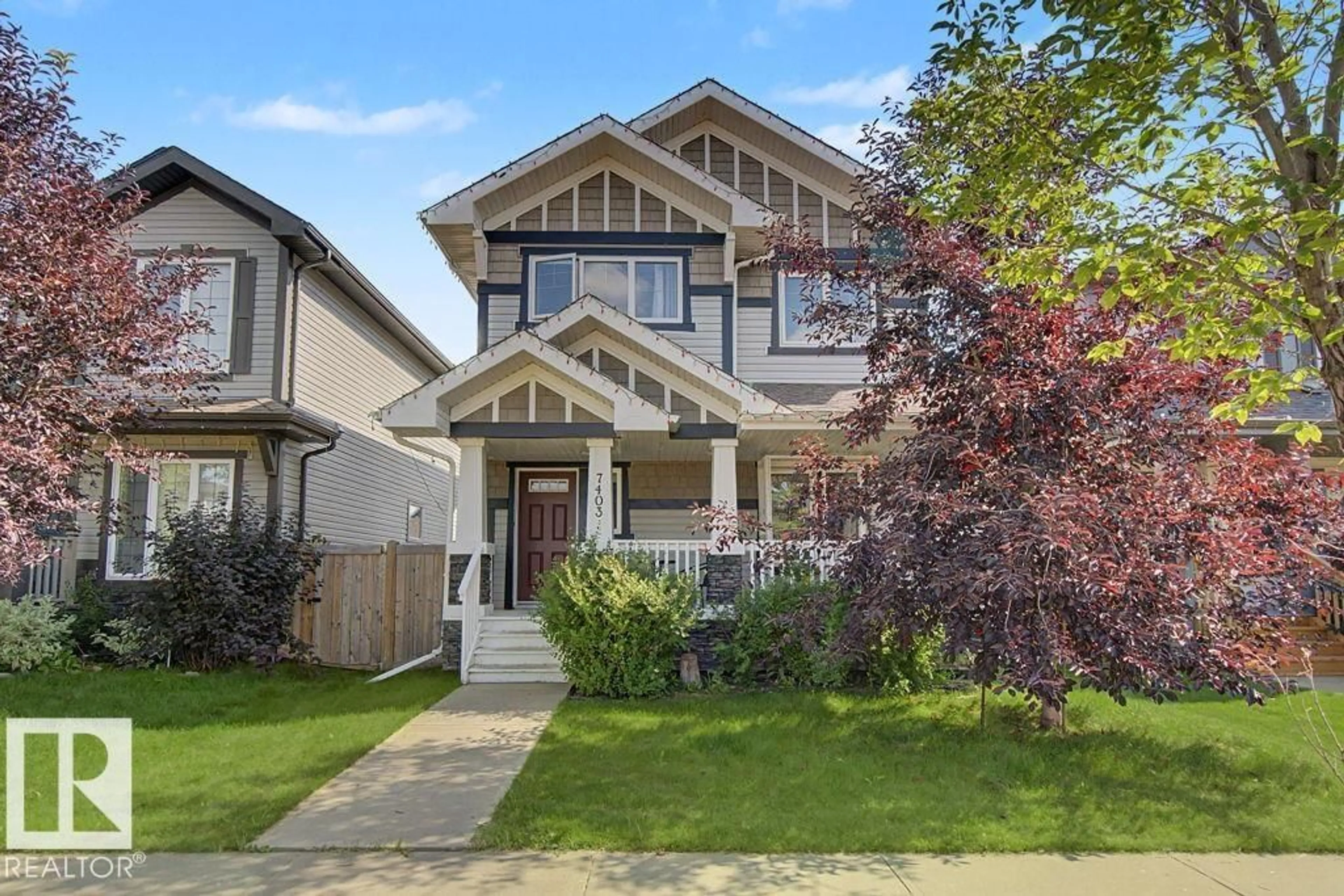 Home with vinyl exterior material, street for NW - 7403 179 AV, Edmonton Alberta T5Z0M7