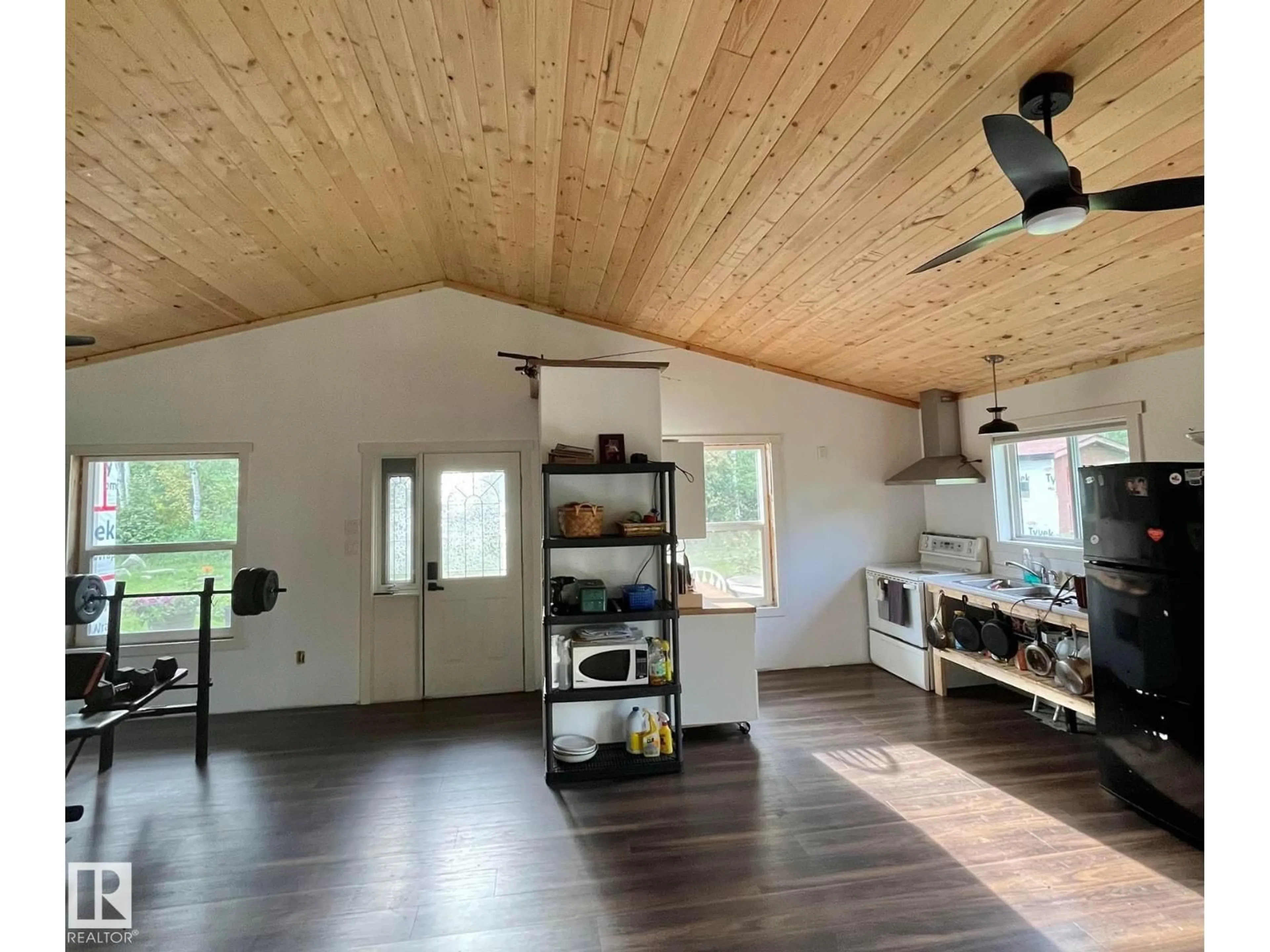 Open concept kitchen, wood/laminate floor for 320 HWY 657, Rural Bonnyville M.D. Alberta T9N2J2