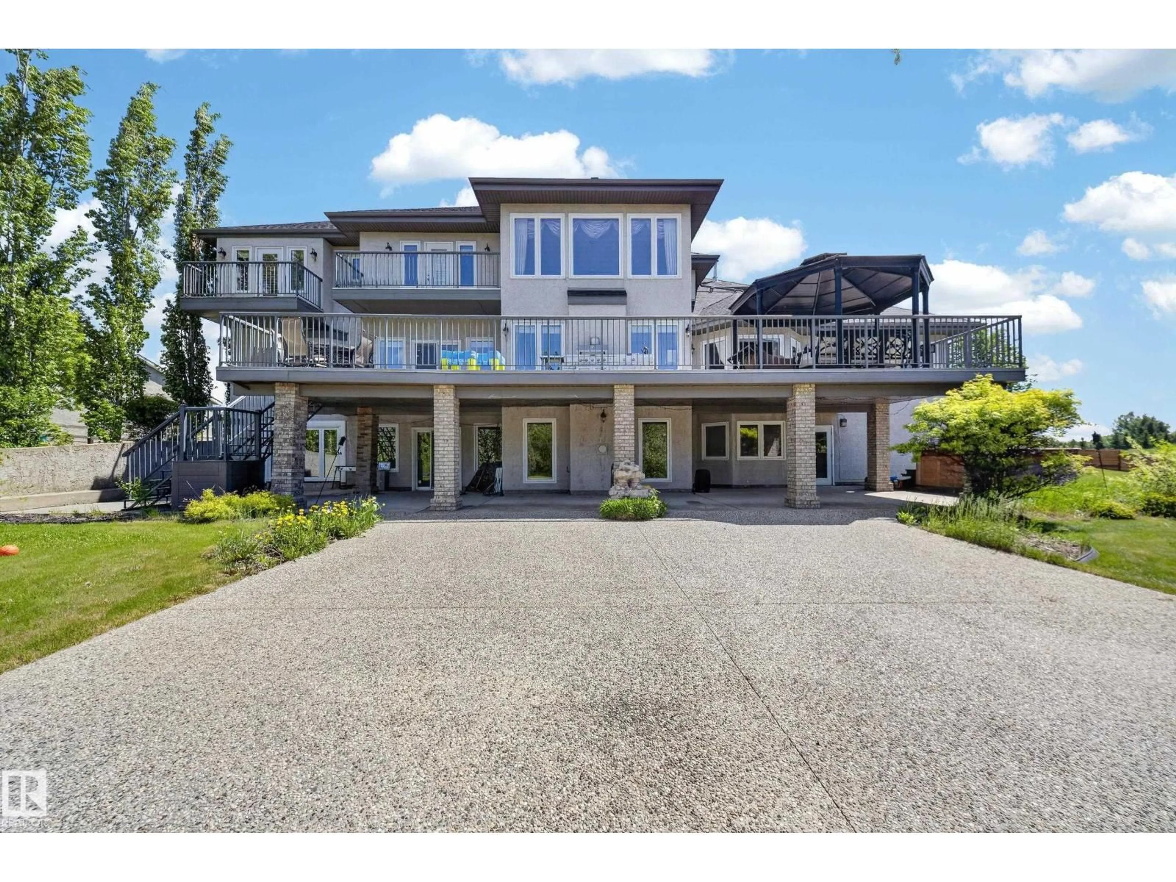A pic from outside/outdoor area/front of a property/back of a property/a pic from drone, unknown for 50 52216 RGE ROAD 233, Rural Strathcona County Alberta T8B1C9