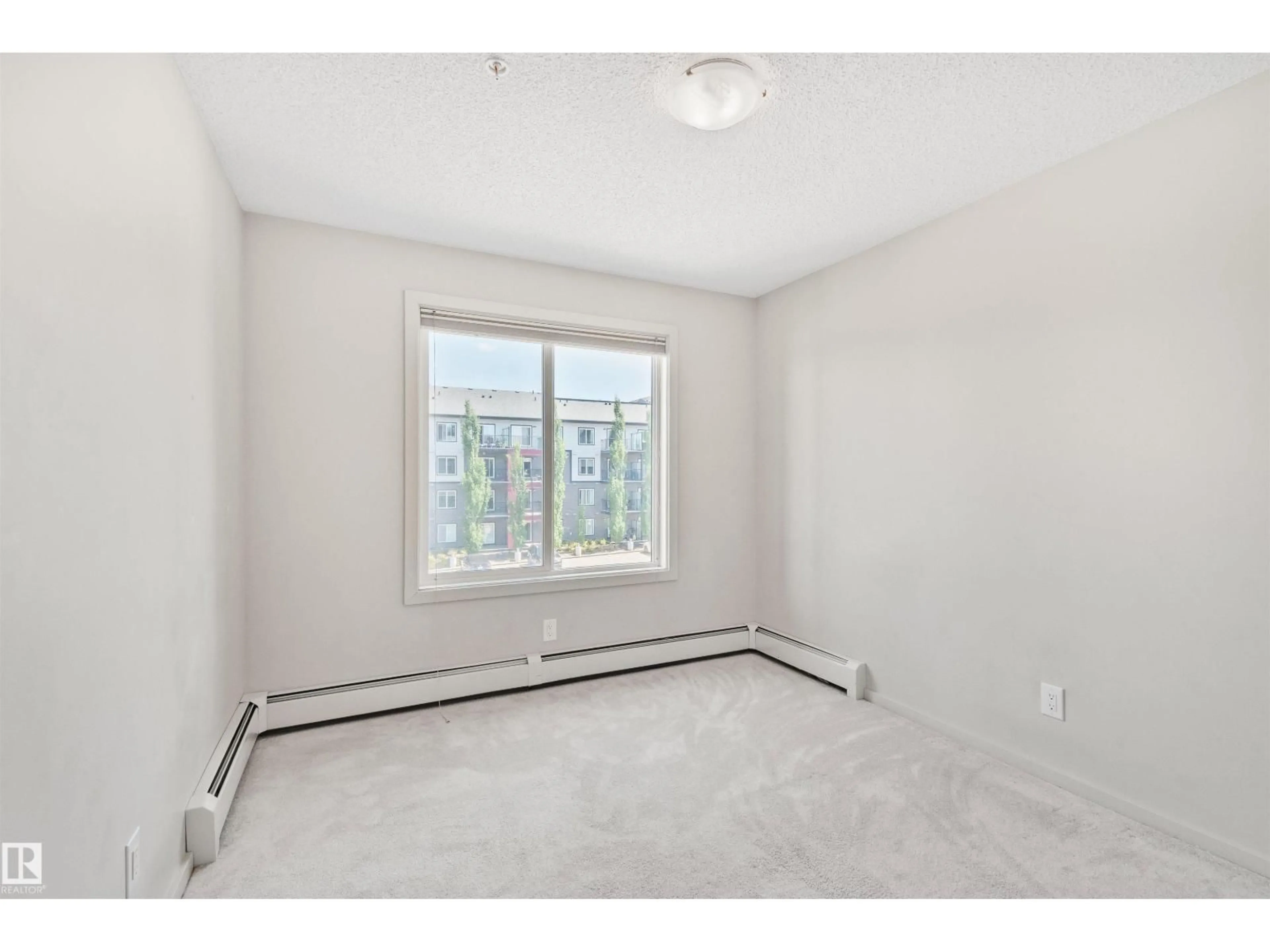 A pic of a room for 318 - 5521 7 AV SW, Edmonton Alberta T6X2A8