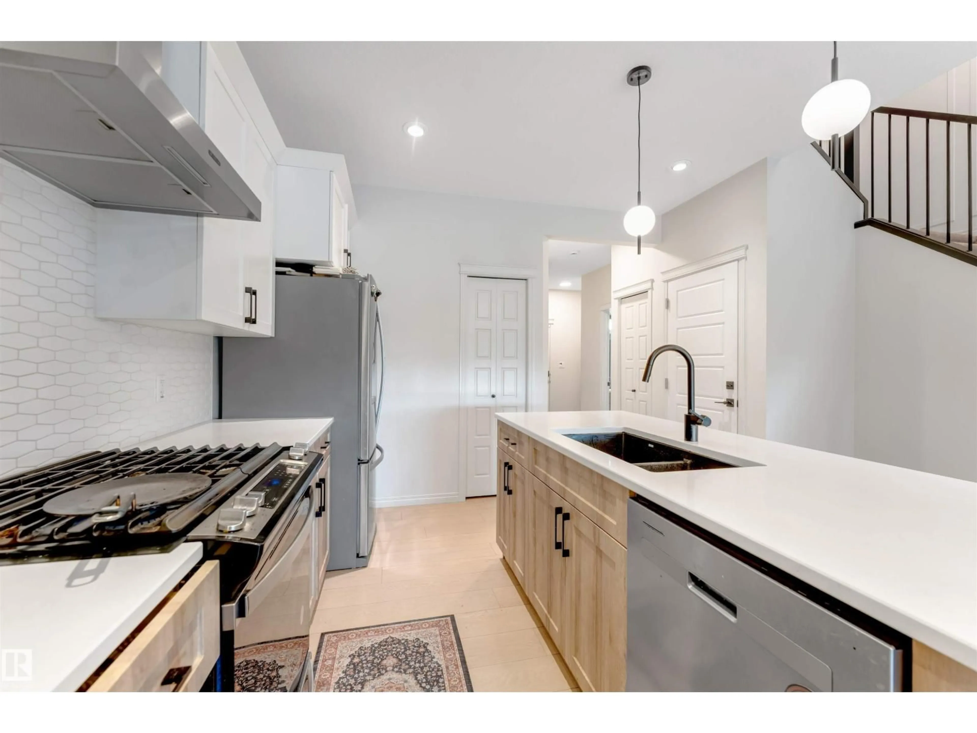 Open concept kitchen, unknown for 1263 WATT DR, Edmonton Alberta T6L6T5