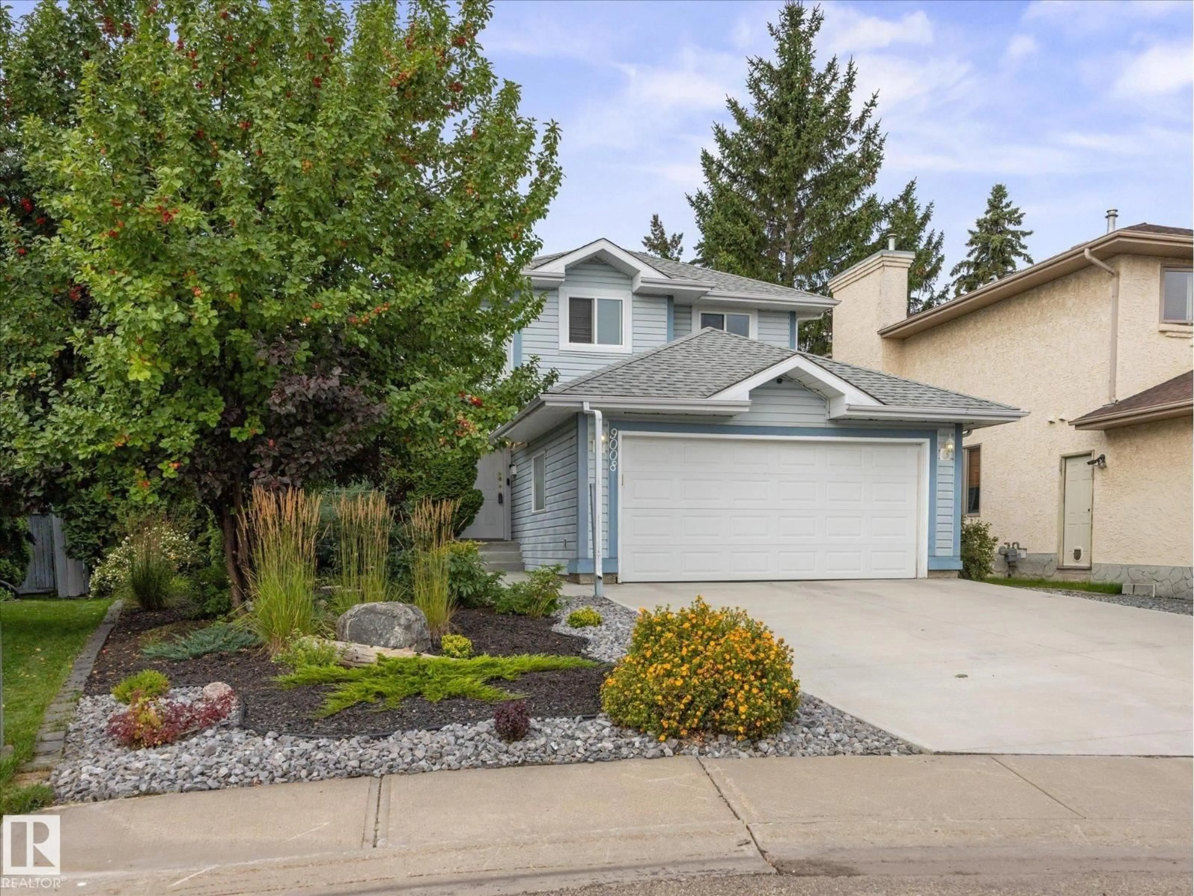 Home with vinyl exterior material, street for NW - 9008 190 ST, Edmonton Alberta T5T5W1