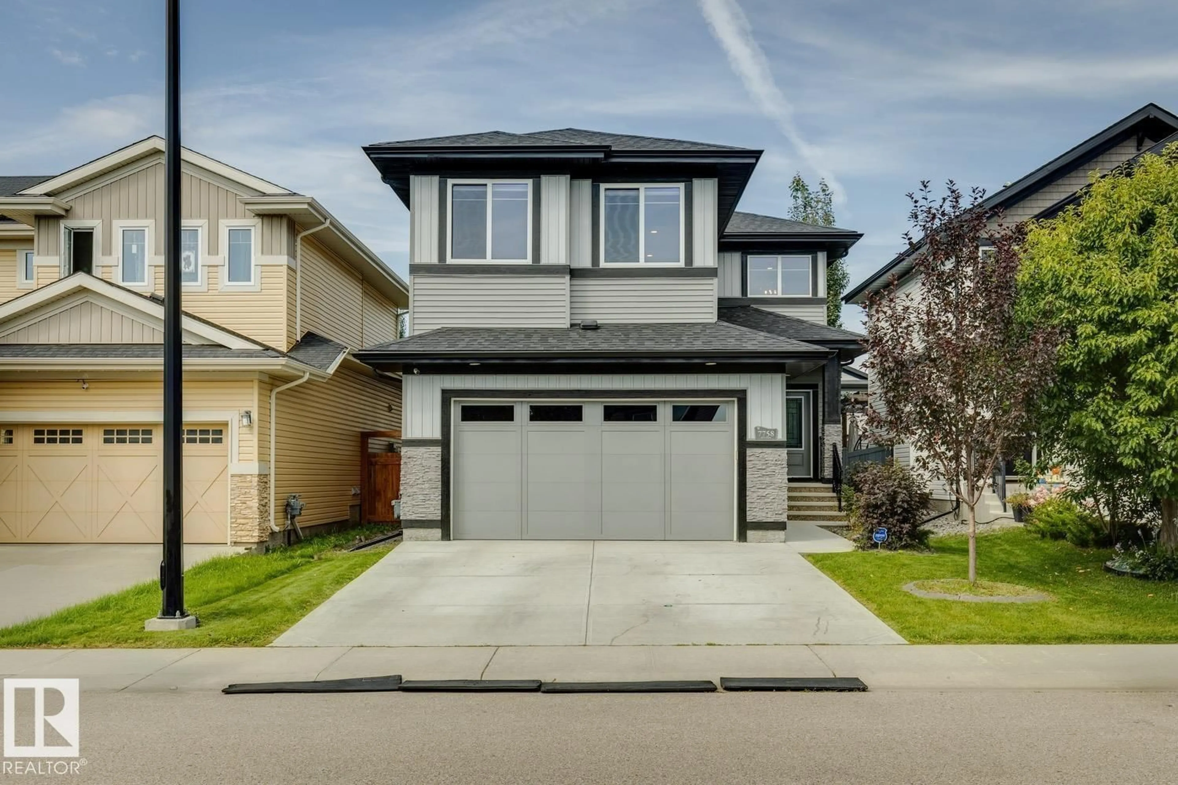 Home with vinyl exterior material, street for NW - 7758 GETTY WD, Edmonton Alberta T5T4T3