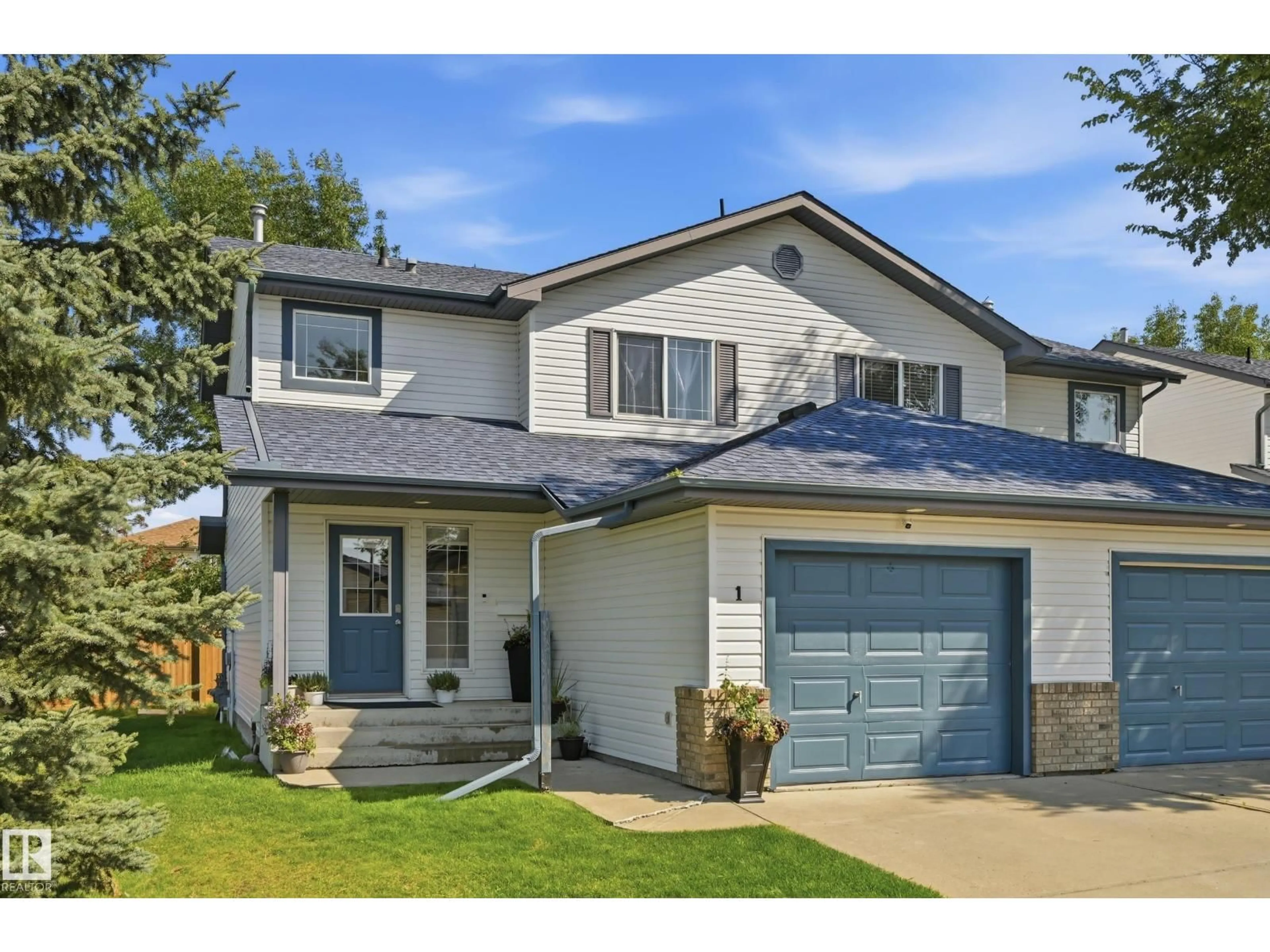 Home with vinyl exterior material, street for 1 GROVE MEADOW DR, Spruce Grove Alberta T7X4L9