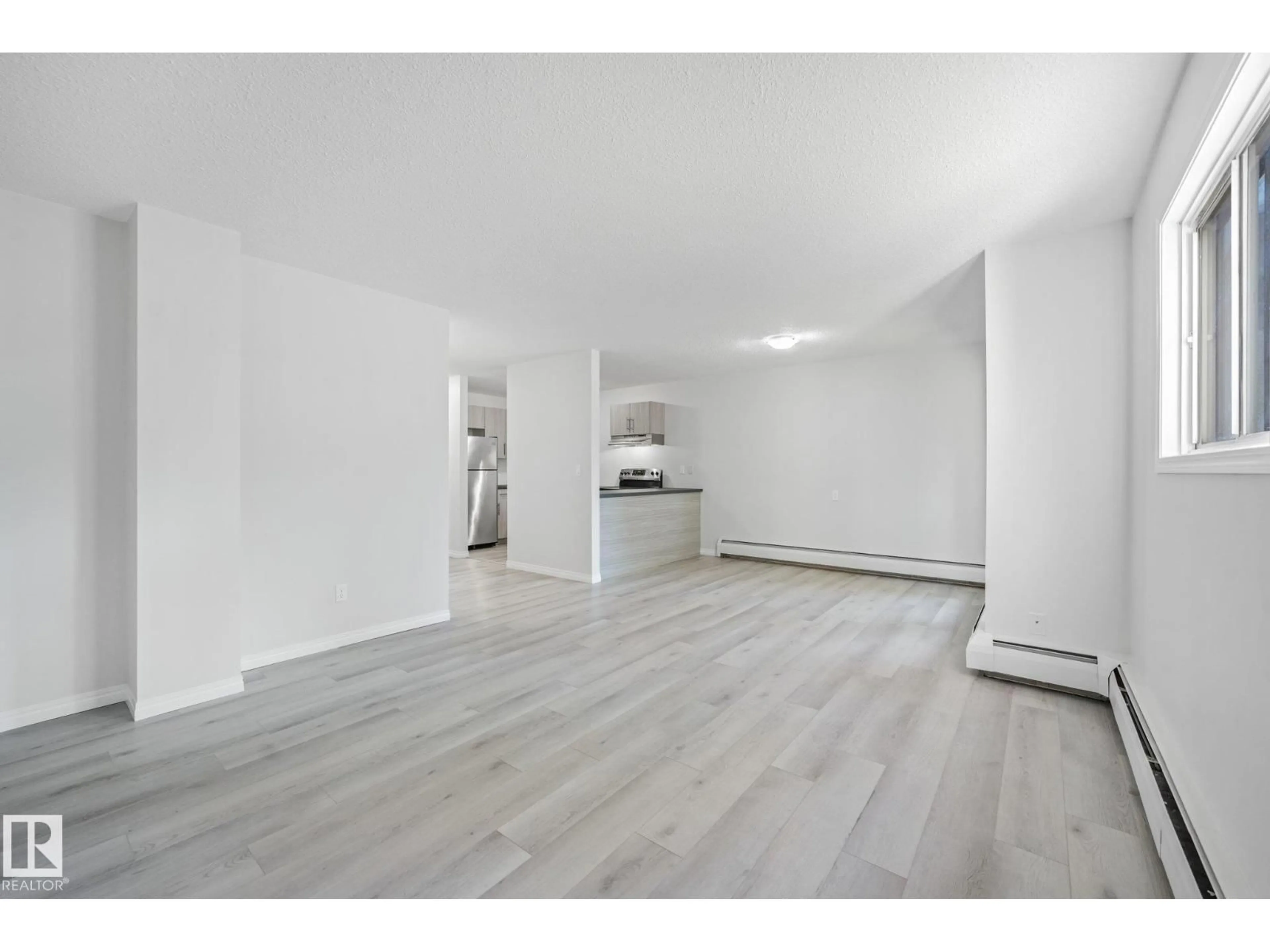 A pic of a room for #101 - 7915 112 AV, Edmonton Alberta T5B0E7