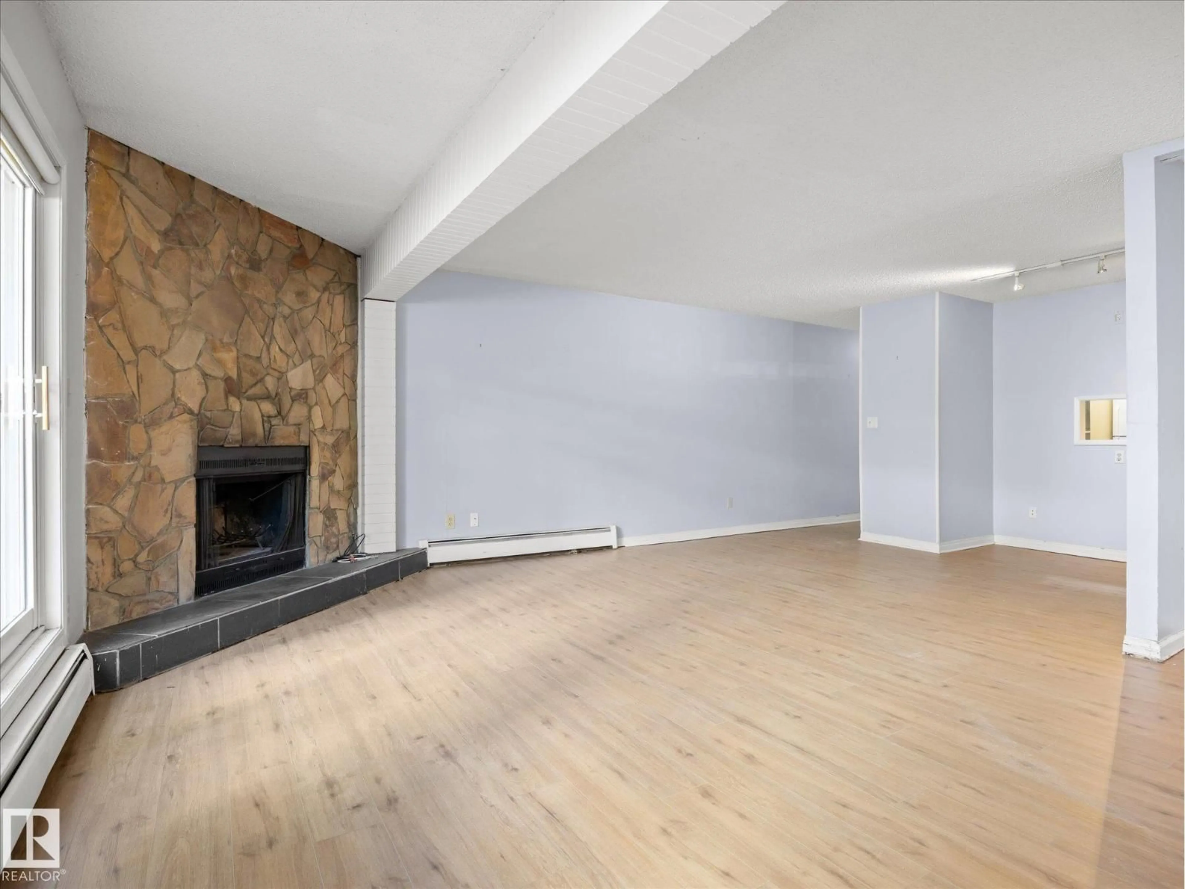 A pic of a room for #110 - 10139 117 ST, Edmonton Alberta T5K2L3