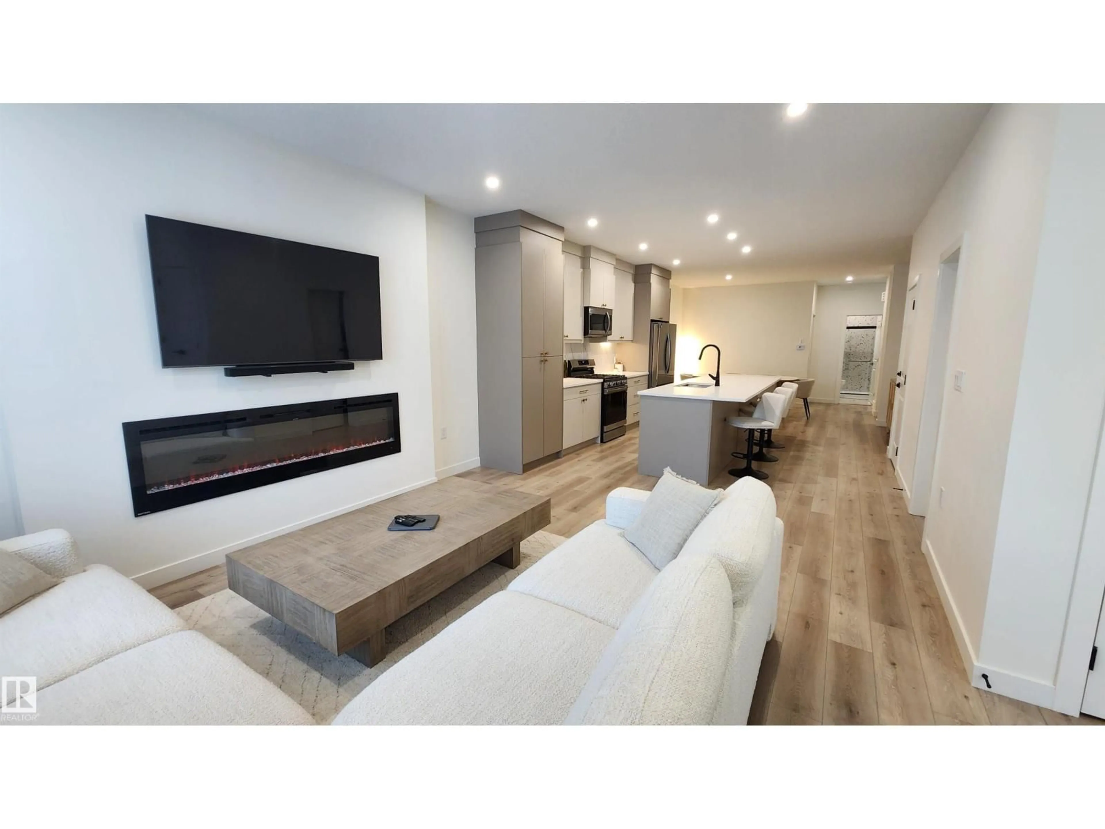 Living room with furniture, wood/laminate floor for 220 28 ST, Edmonton Alberta T6X3E4
