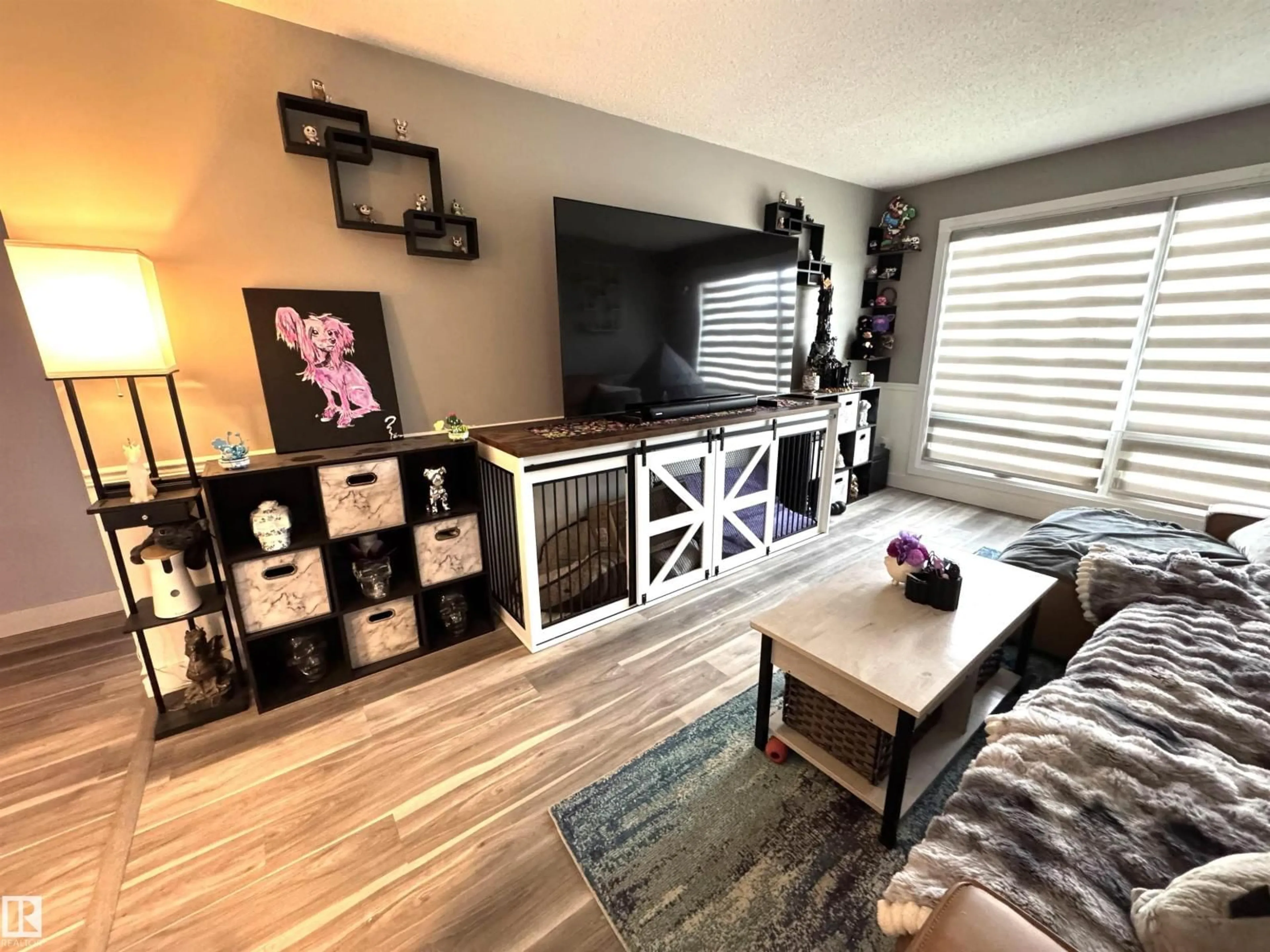 Living room with furniture, wood/laminate floor for 9413 80 ST, Fort Saskatchewan Alberta T8L3R5