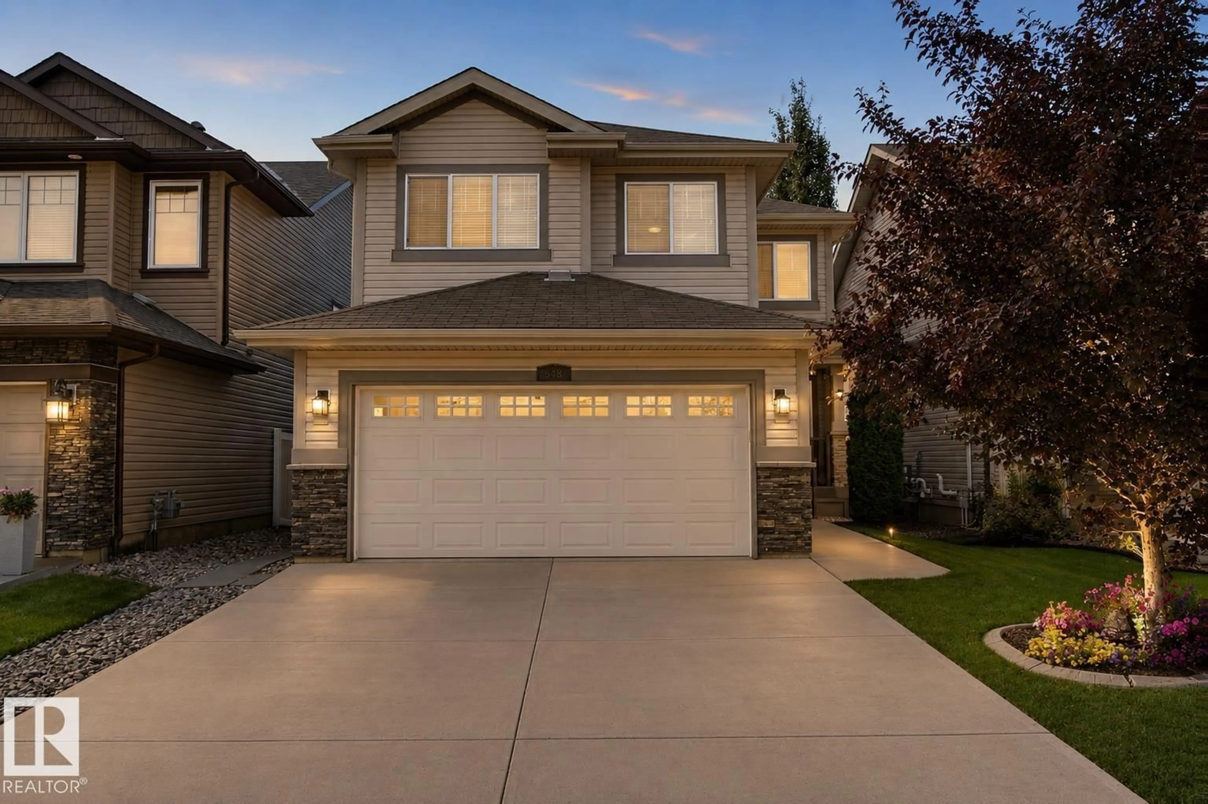 Home with vinyl exterior material, street for 548 171 ST, Edmonton Alberta T6W0M1