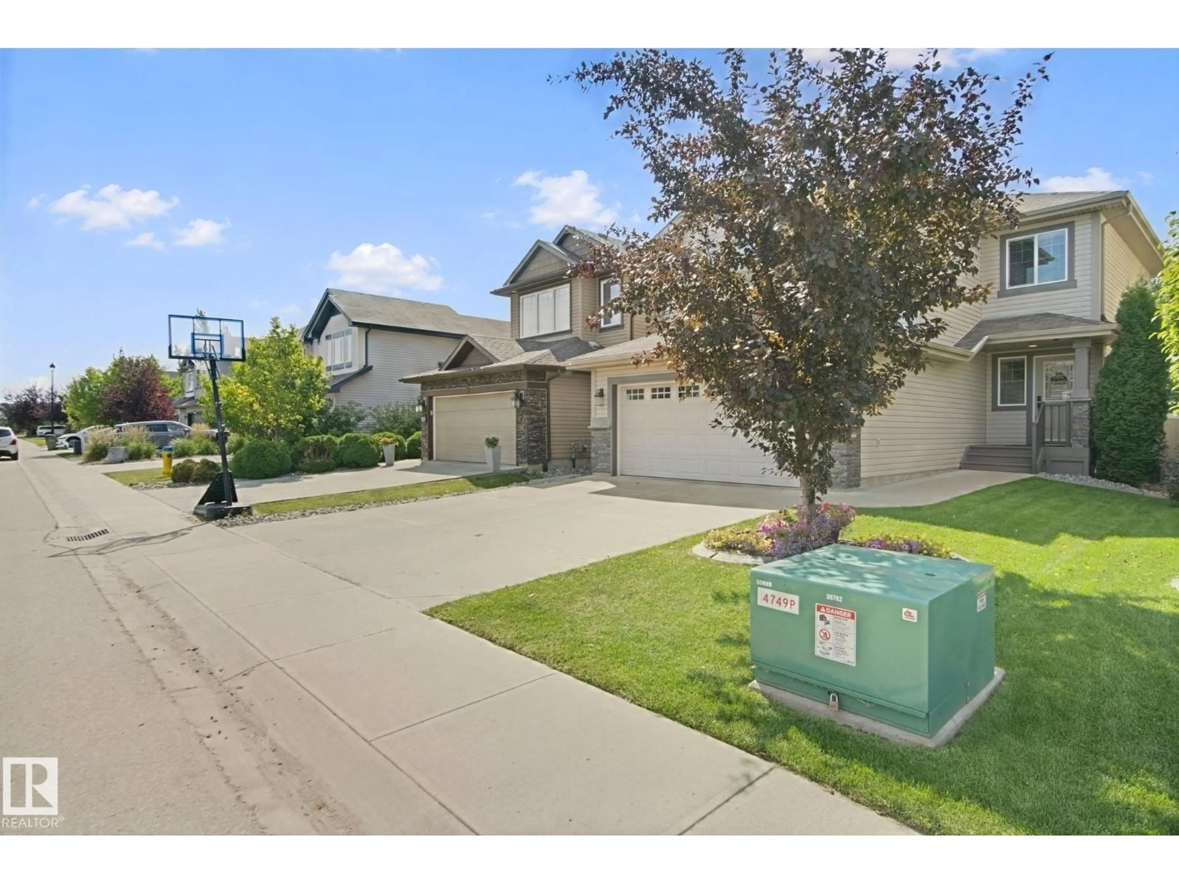 A pic from outside/outdoor area/front of a property/back of a property/a pic from drone, street for 548 171 ST, Edmonton Alberta T6W0M1