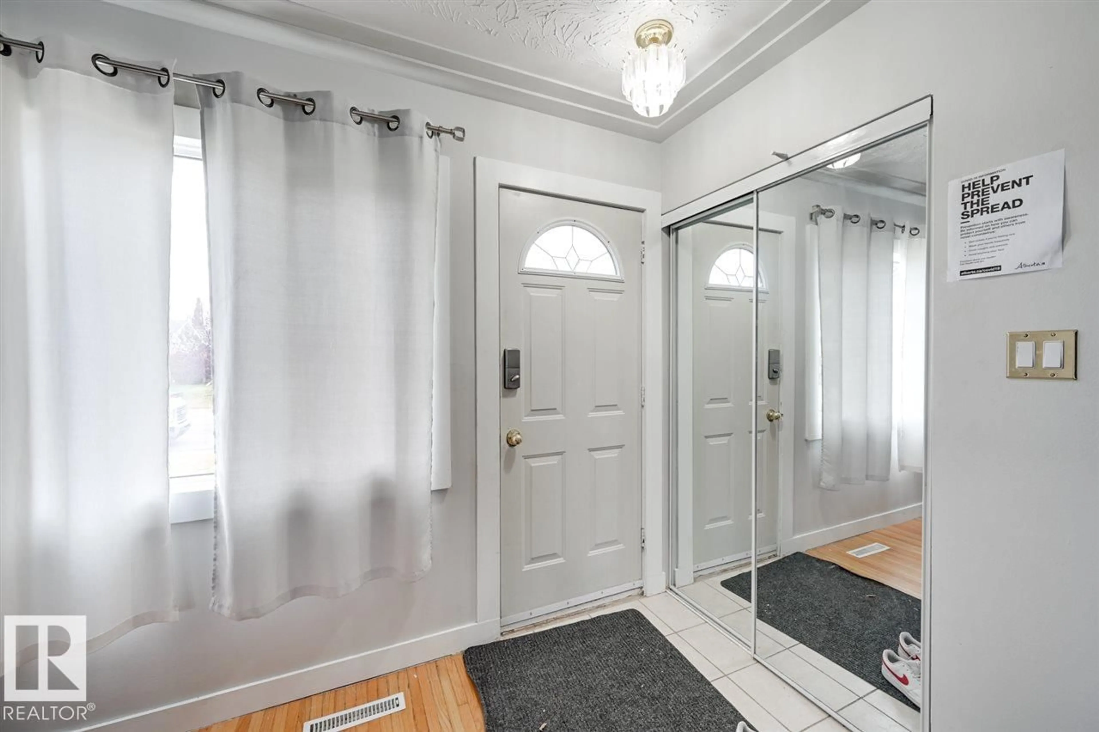 Indoor entryway for 13214 123 ST, Edmonton Alberta T5L0J9