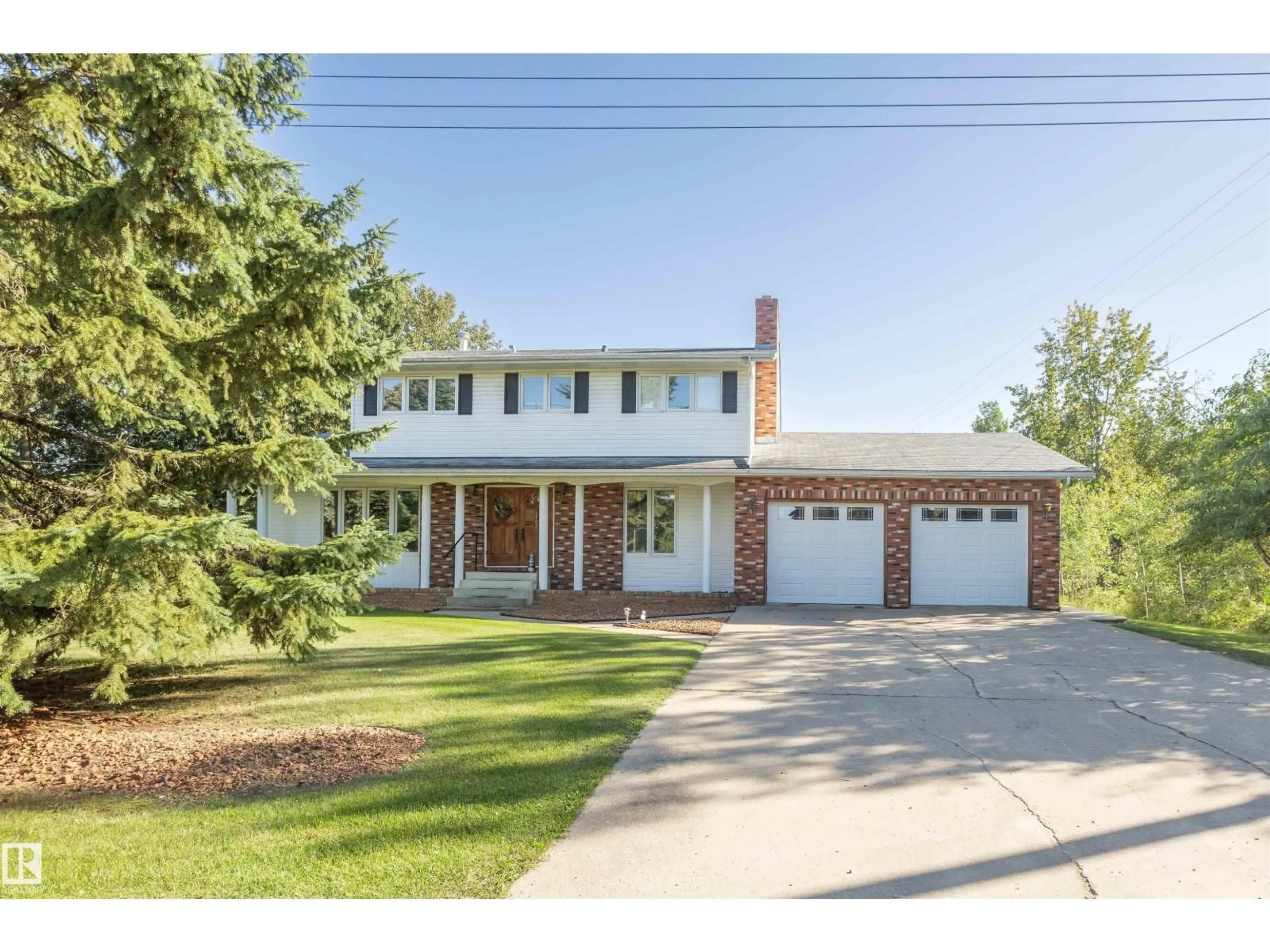 Home with brick exterior material, street for 5407 MEHDEN ROAD, Barrhead Alberta T7N1G2