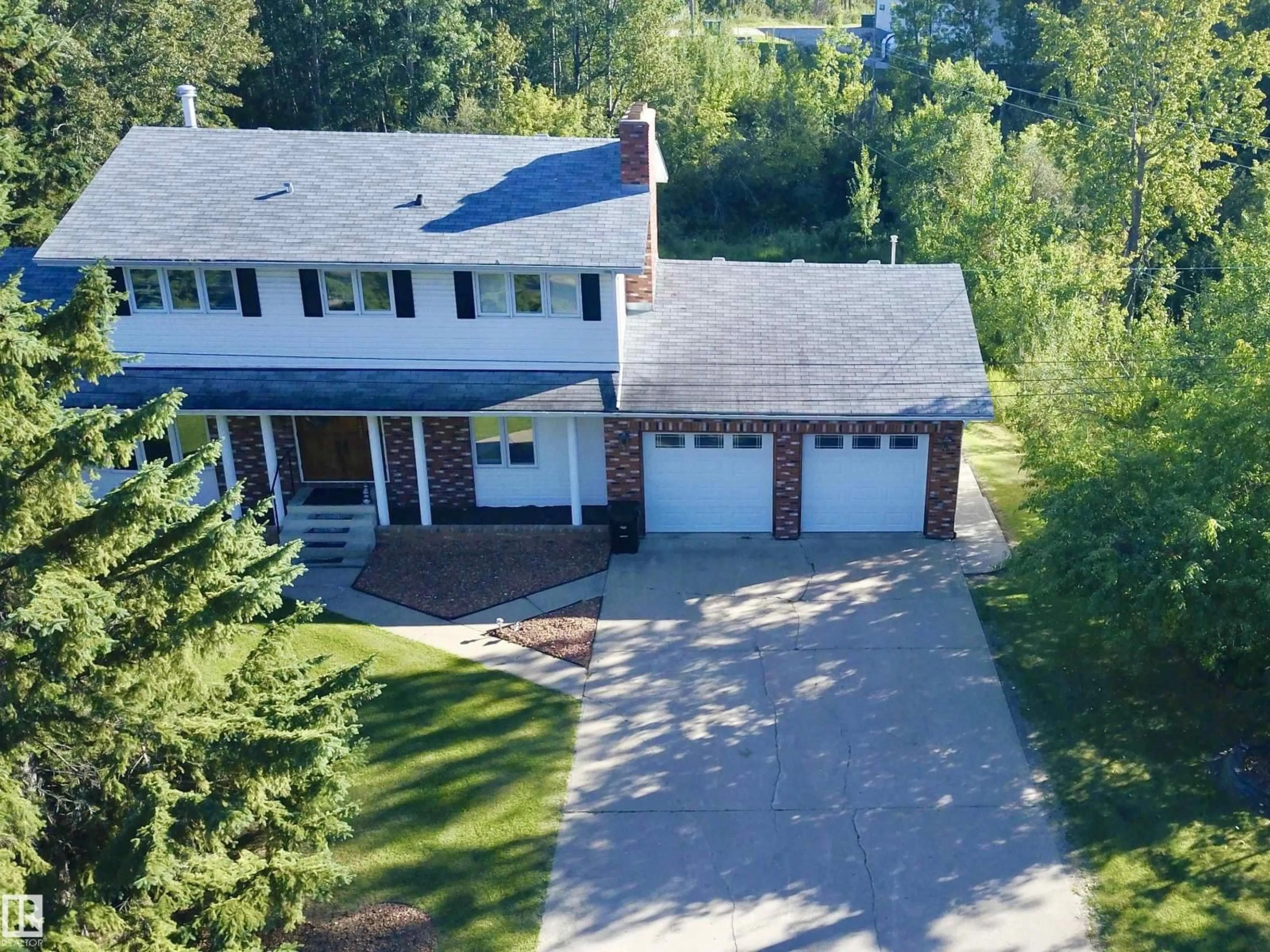 A pic from outside/outdoor area/front of a property/back of a property/a pic from drone, street for 5407 MEHDEN ROAD, Barrhead Alberta T7N1G2