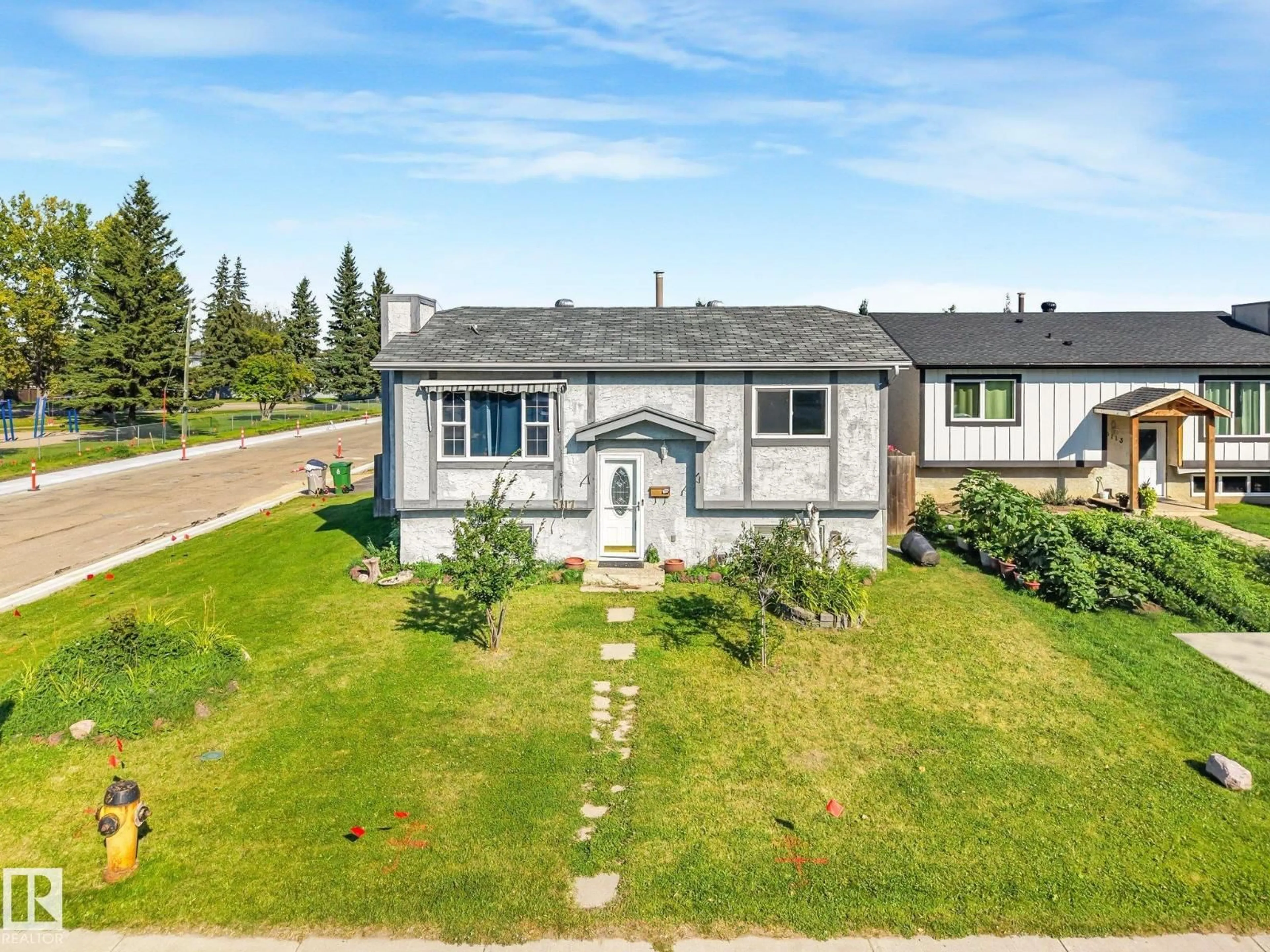 A pic from outside/outdoor area/front of a property/back of a property/a pic from drone, street for 5117 52 ST, Calmar Alberta T0C0V0