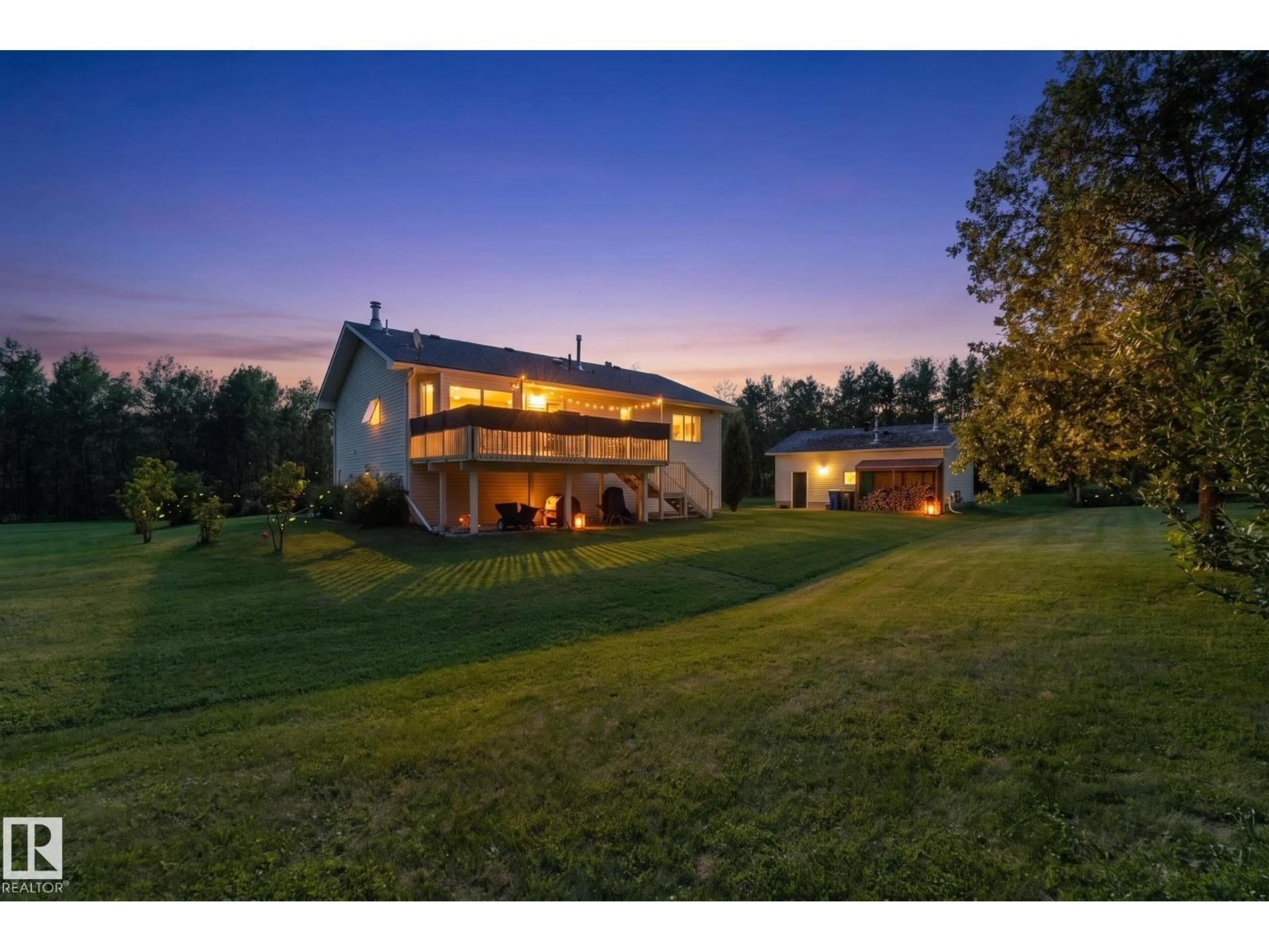 A pic from outside/outdoor area/front of a property/back of a property/a pic from drone, mountain view for #4 - 53222 RGE ROAD 34, Rural Parkland County Alberta T0E0N0