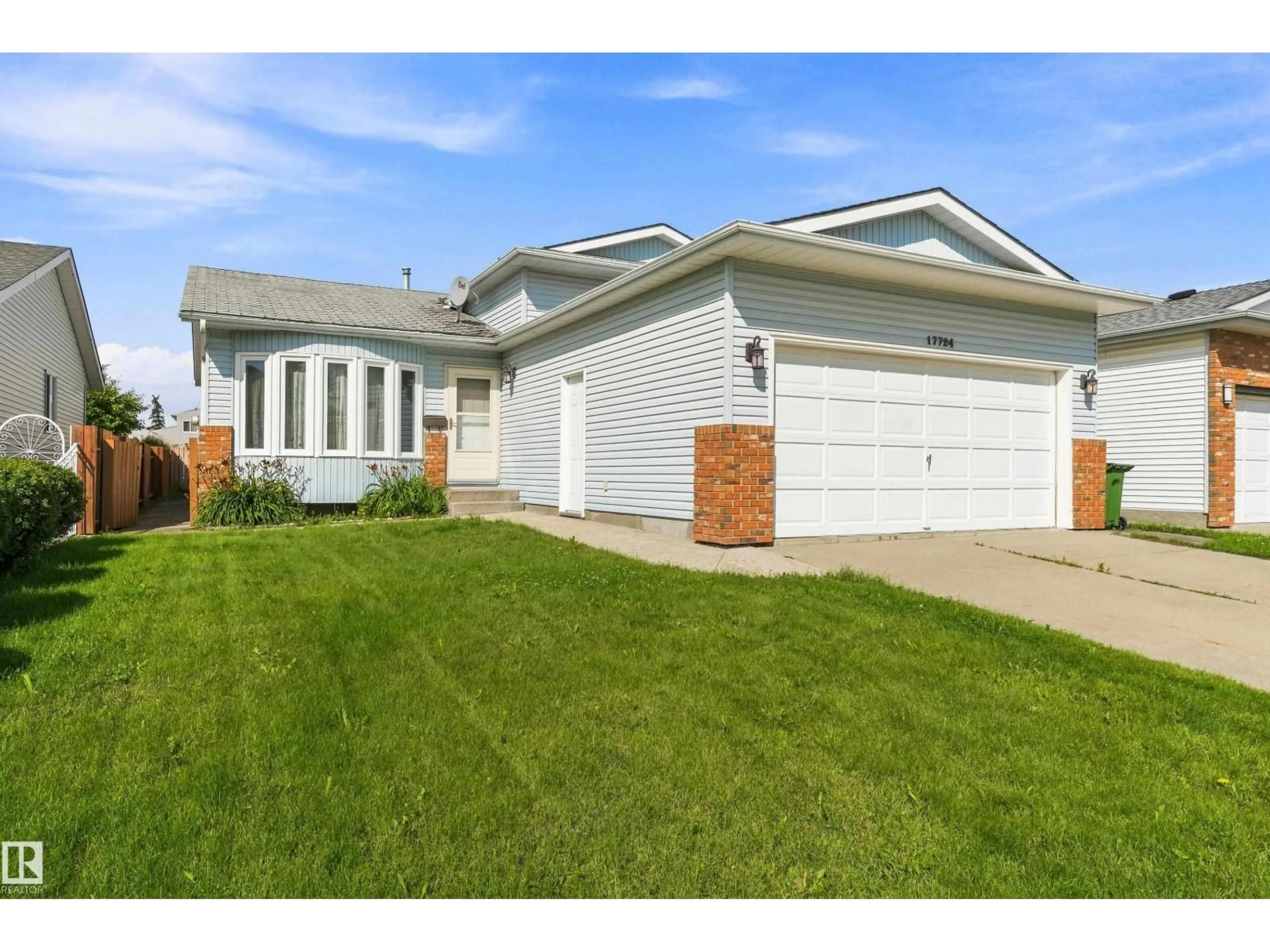 Home with vinyl exterior material, street for 17724 94 ST, Edmonton Alberta T5Z2H4