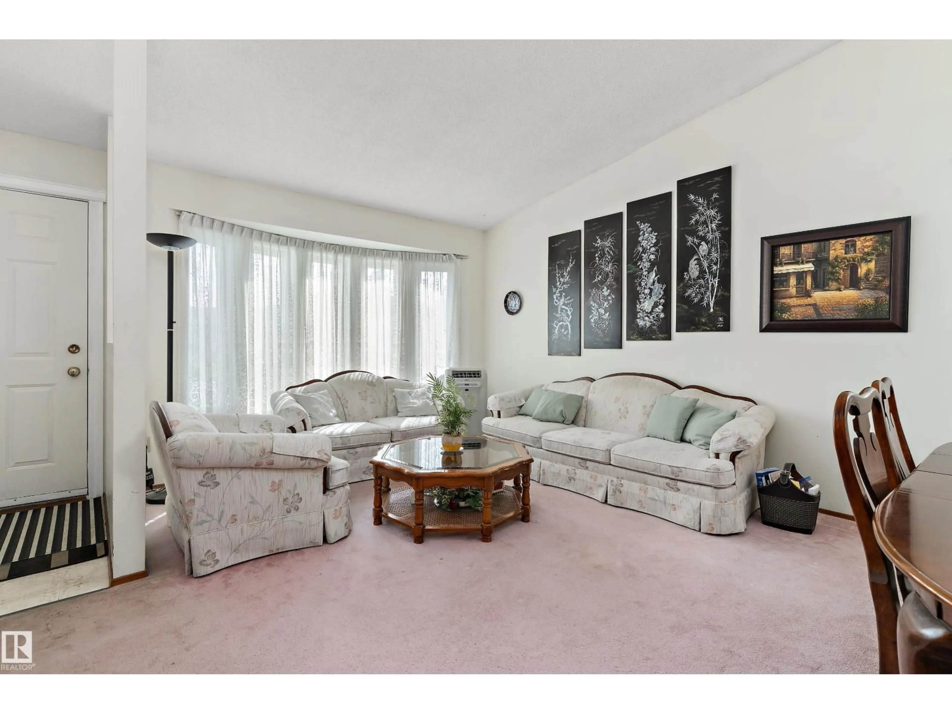 Living room with furniture, carpet floor for 17724 94 ST, Edmonton Alberta T5Z2H4