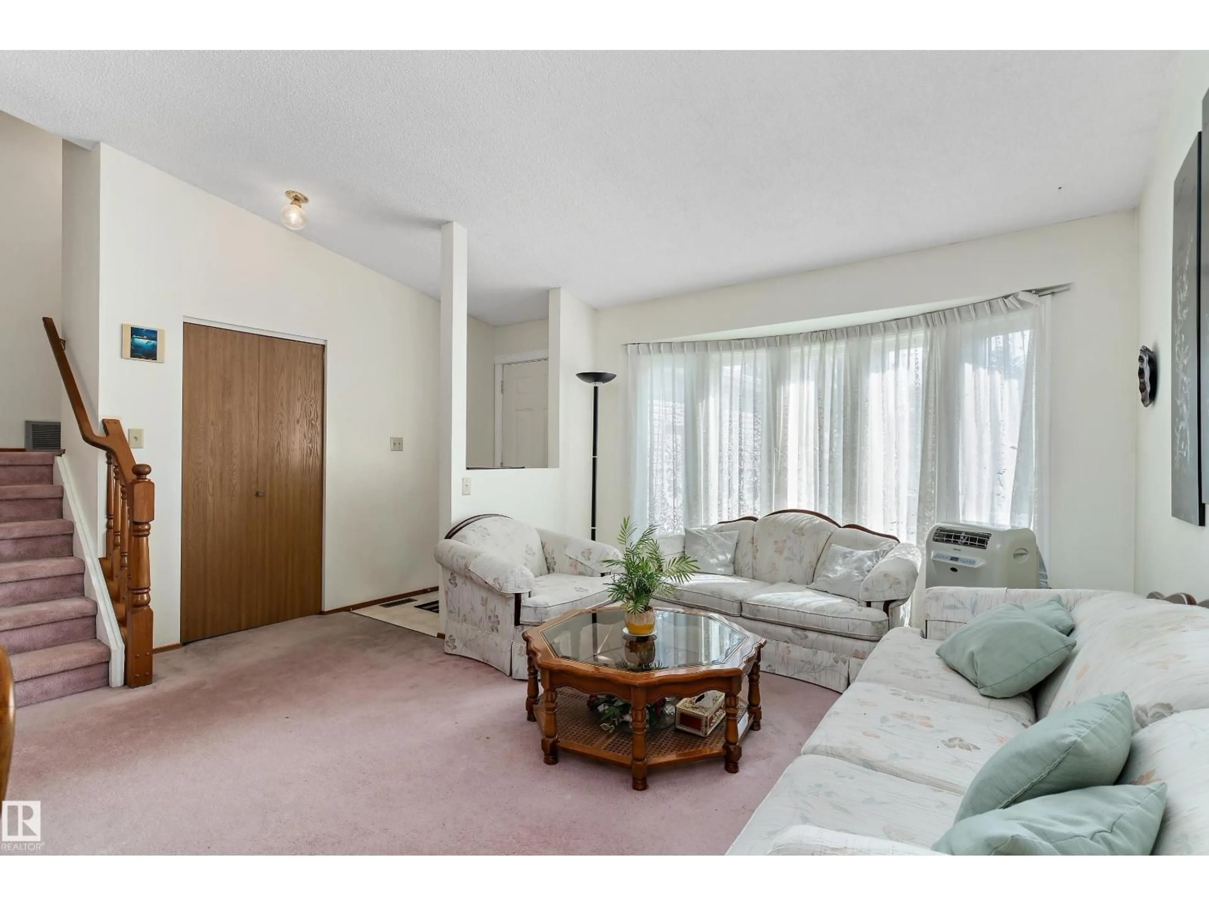 Living room with furniture, unknown for 17724 94 ST, Edmonton Alberta T5Z2H4