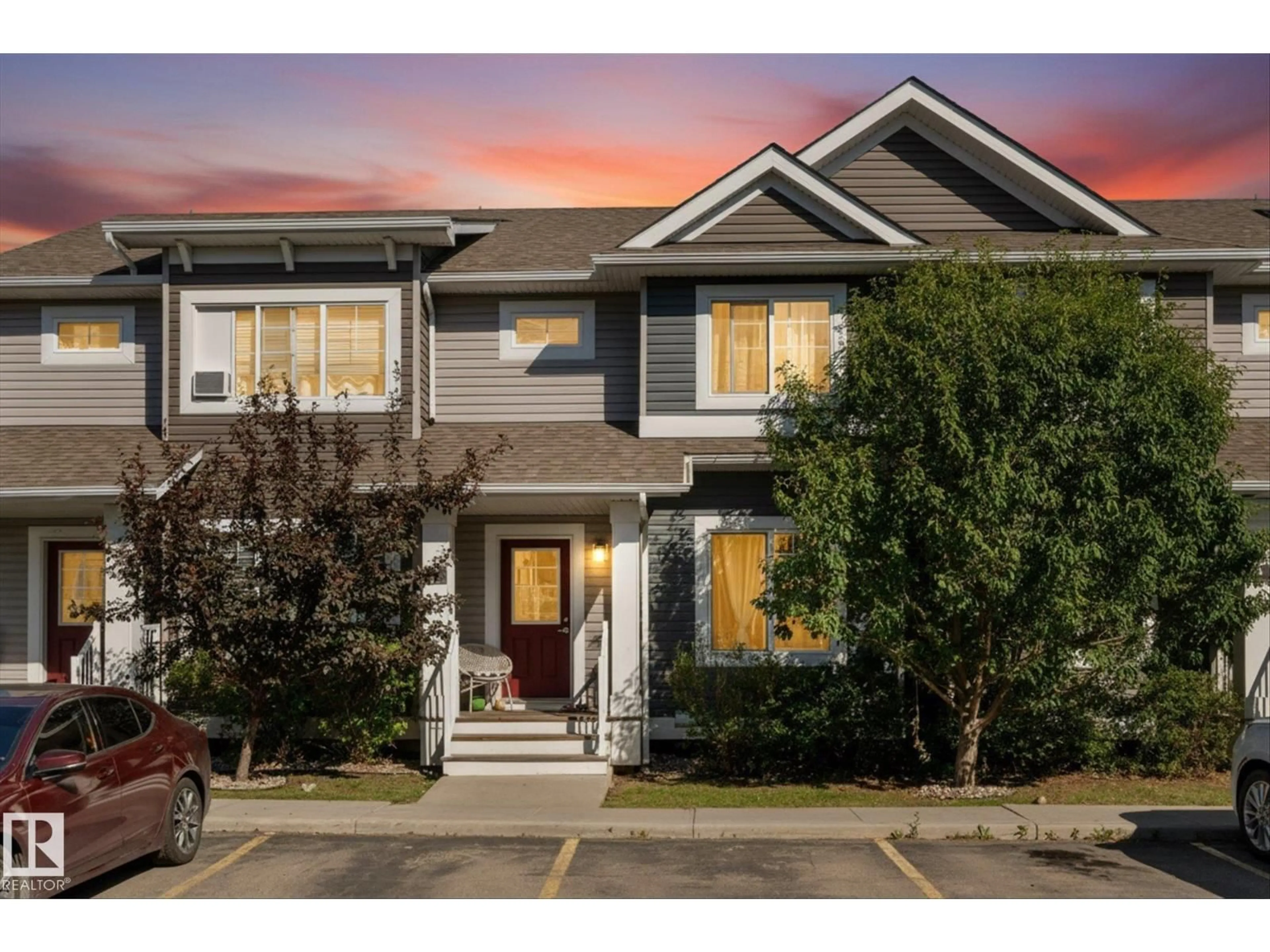Home with vinyl exterior material, street for #2 - 5203 149 AV, Edmonton Alberta T5A1B5
