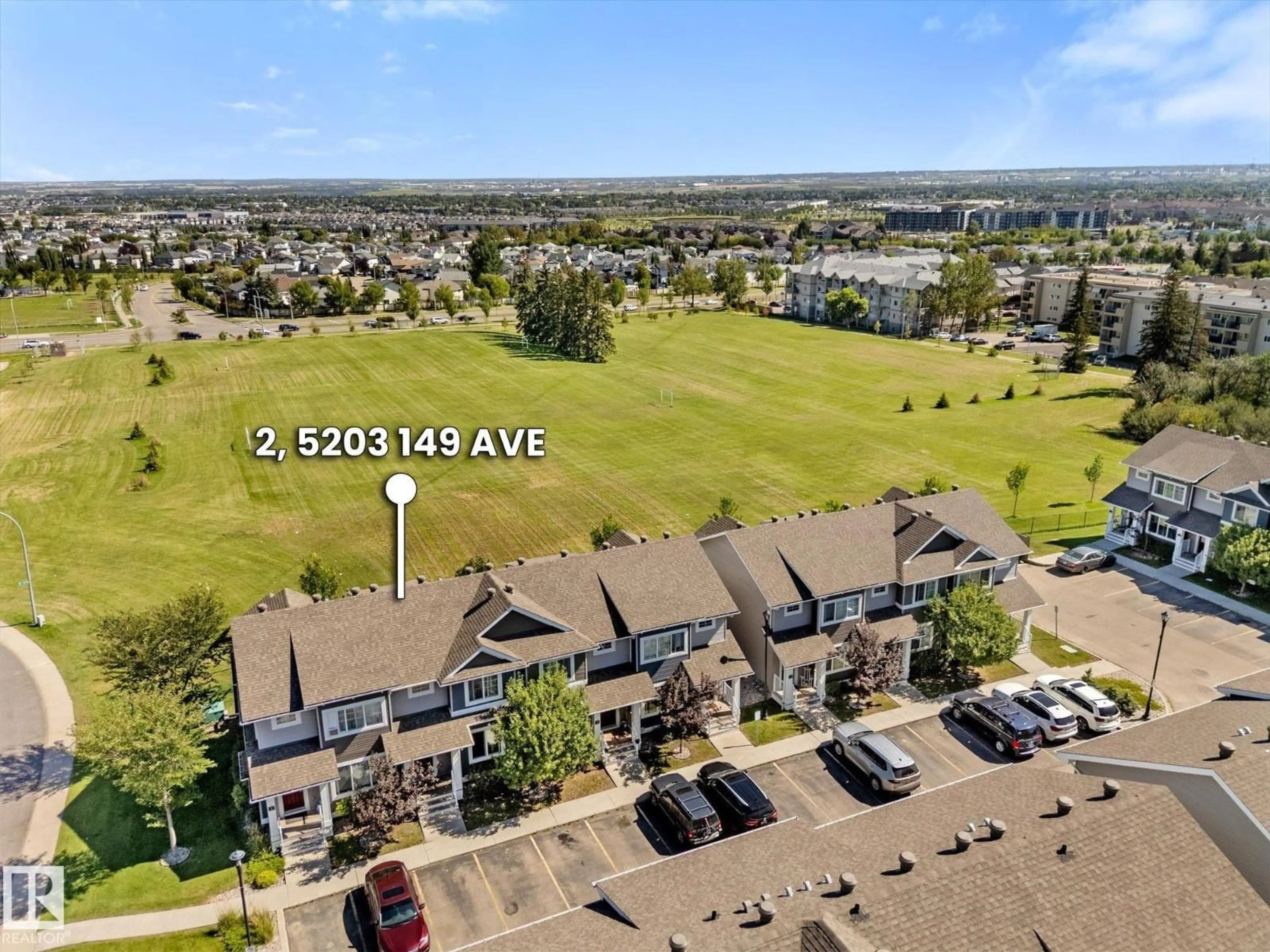 A pic from outside/outdoor area/front of a property/back of a property/a pic from drone, mountain view for #2 - 5203 149 AV, Edmonton Alberta T5A1B5