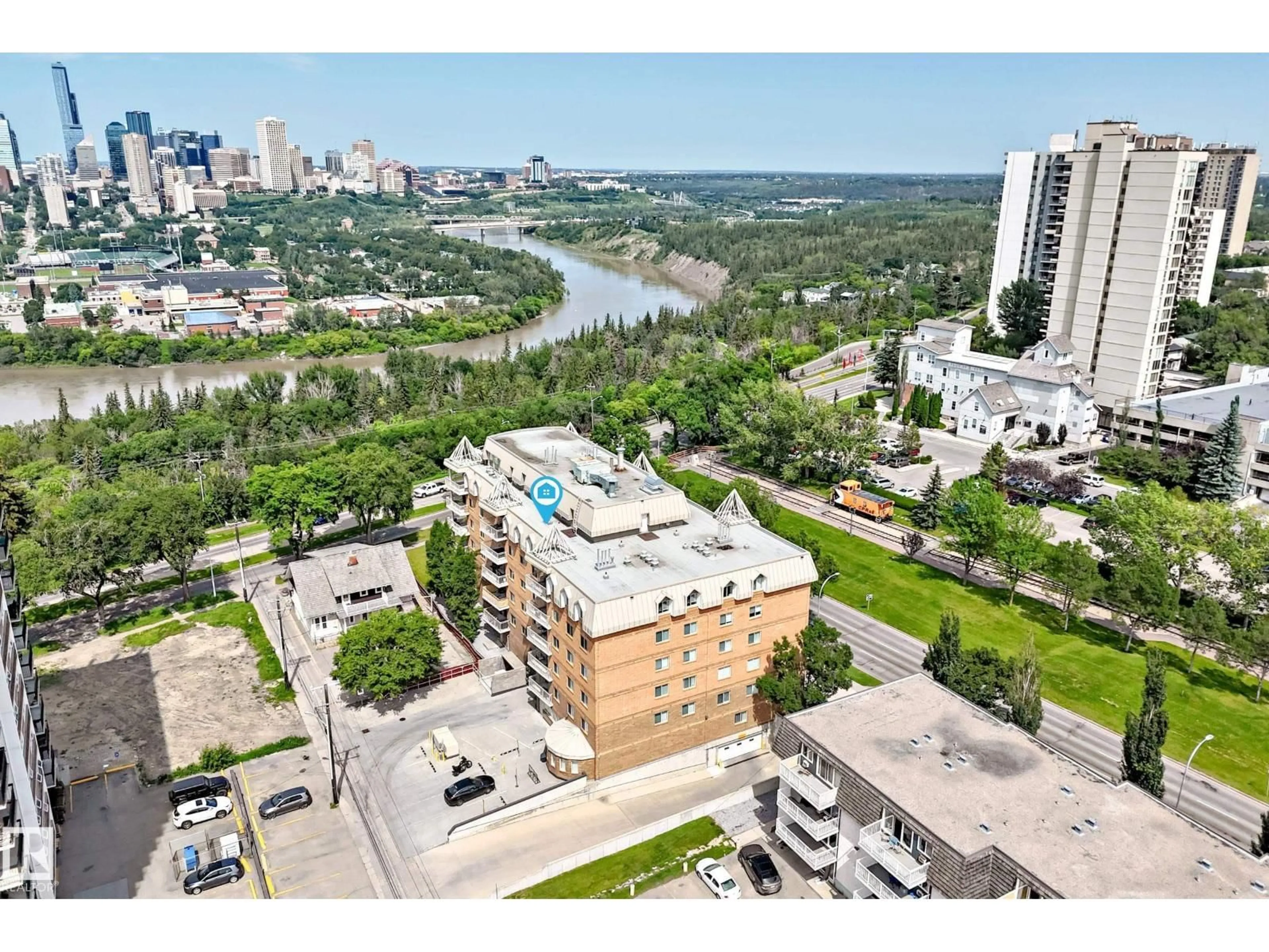 A pic from outside/outdoor area/front of a property/back of a property/a pic from drone, water/lake/river/ocean view for 8728 - 606 GATEWAY BV, Edmonton Alberta T6E6K3