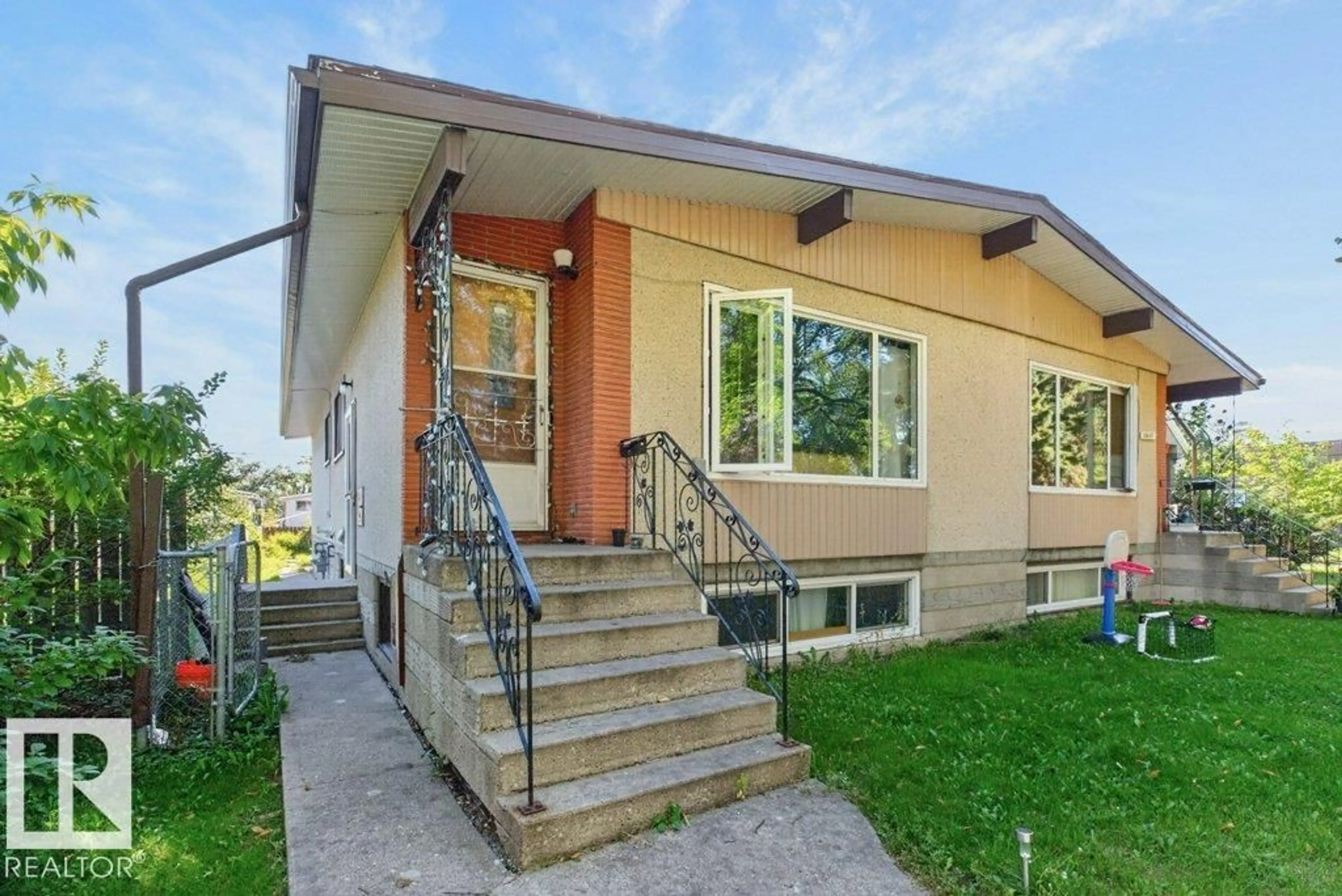 Home with vinyl exterior material, street for NW - 12007 104 ST, Edmonton Alberta T5G2L5