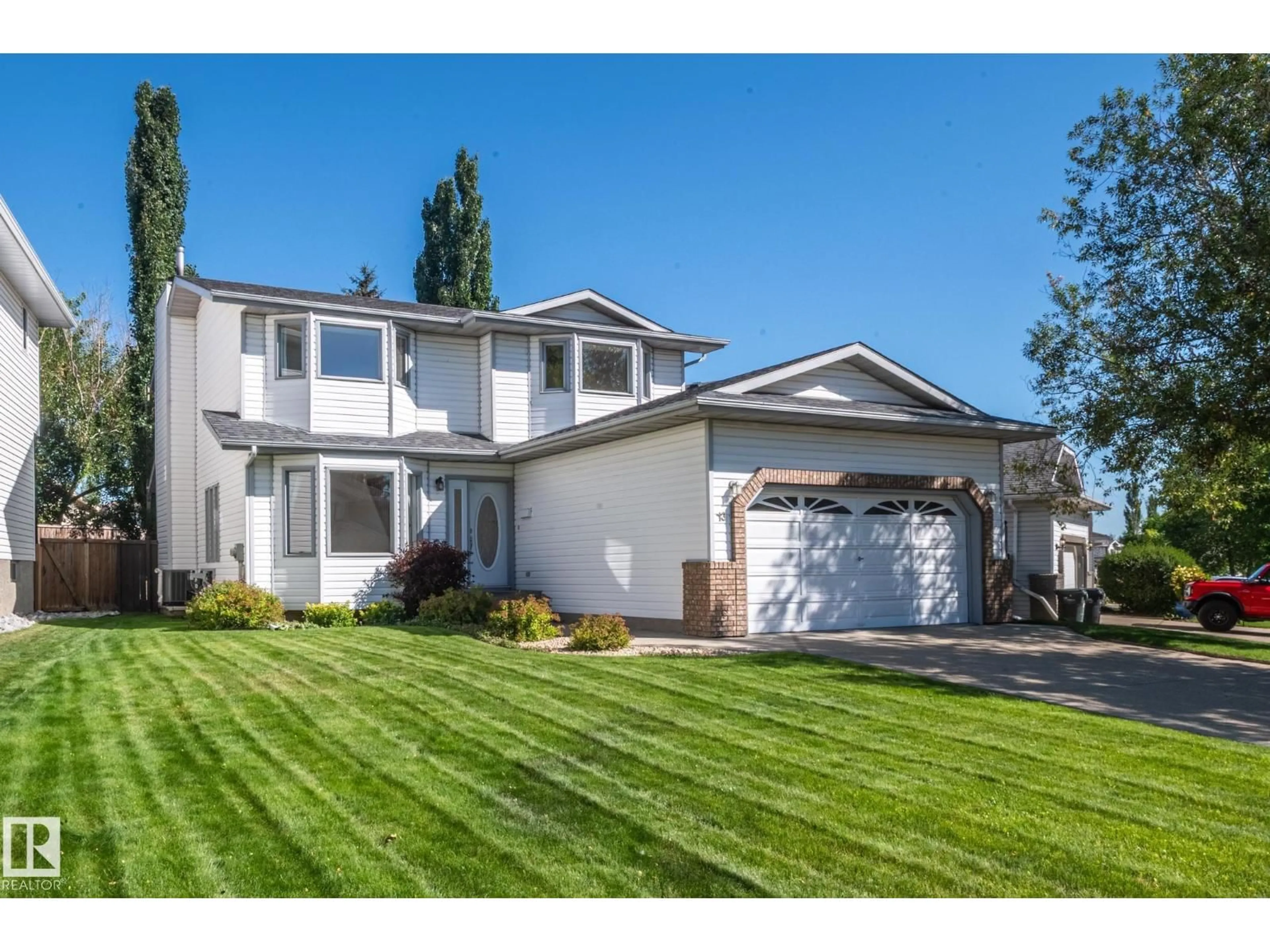 Home with vinyl exterior material, street for 13 CANYON DR, Sherwood Park Alberta T8H1N3