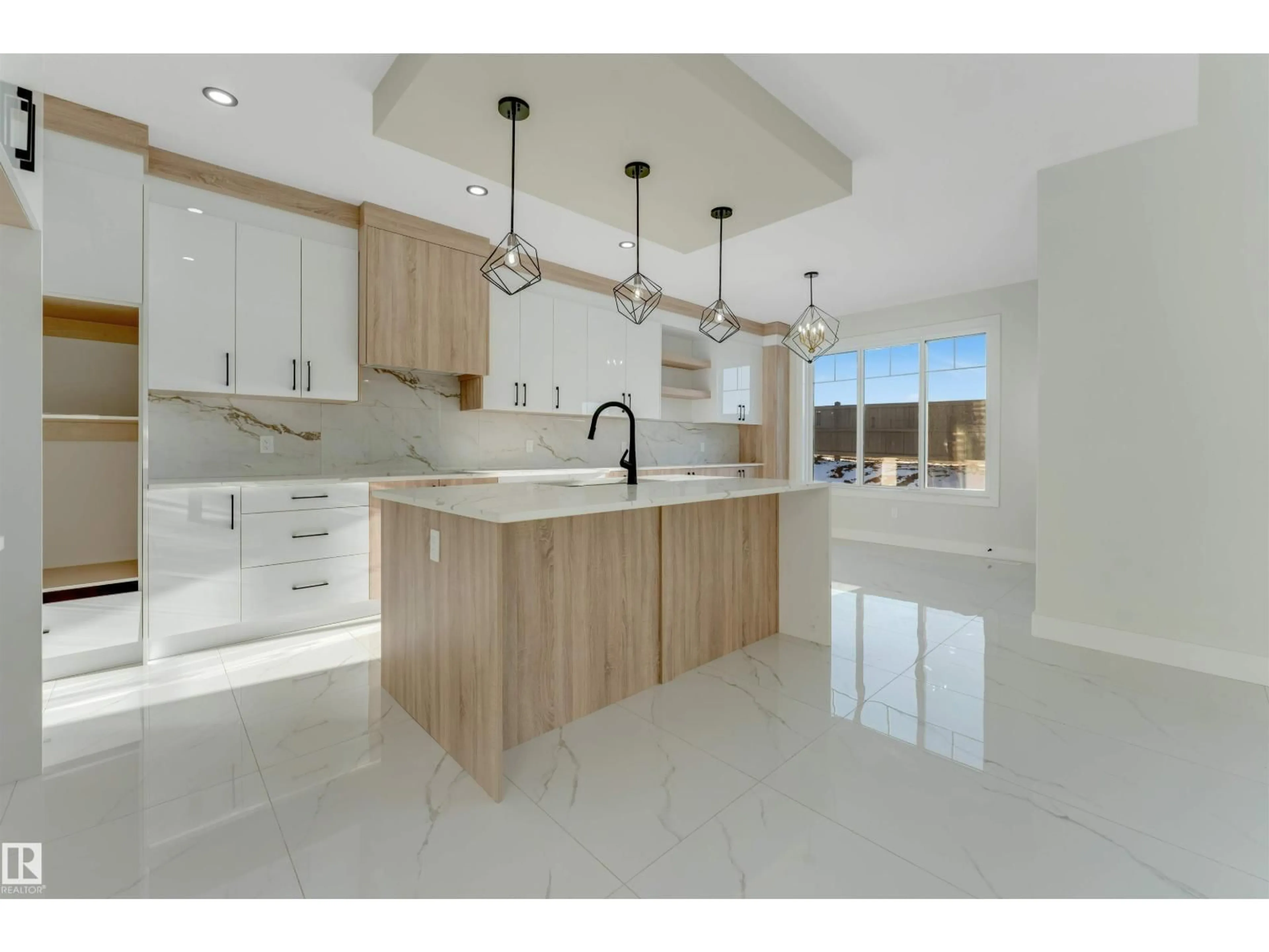 Open concept kitchen, ceramic/tile floor for #4012 - 4012 40 ST, Beaumont Alberta T4X3B6