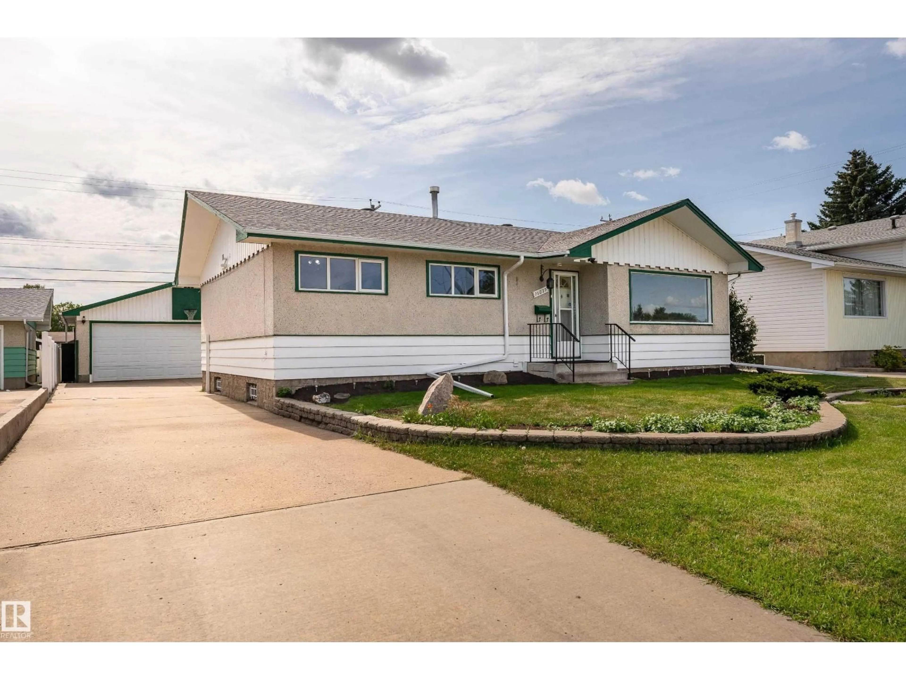 Home with vinyl exterior material, street for 16029 95 AV, Edmonton Alberta T5P0A8