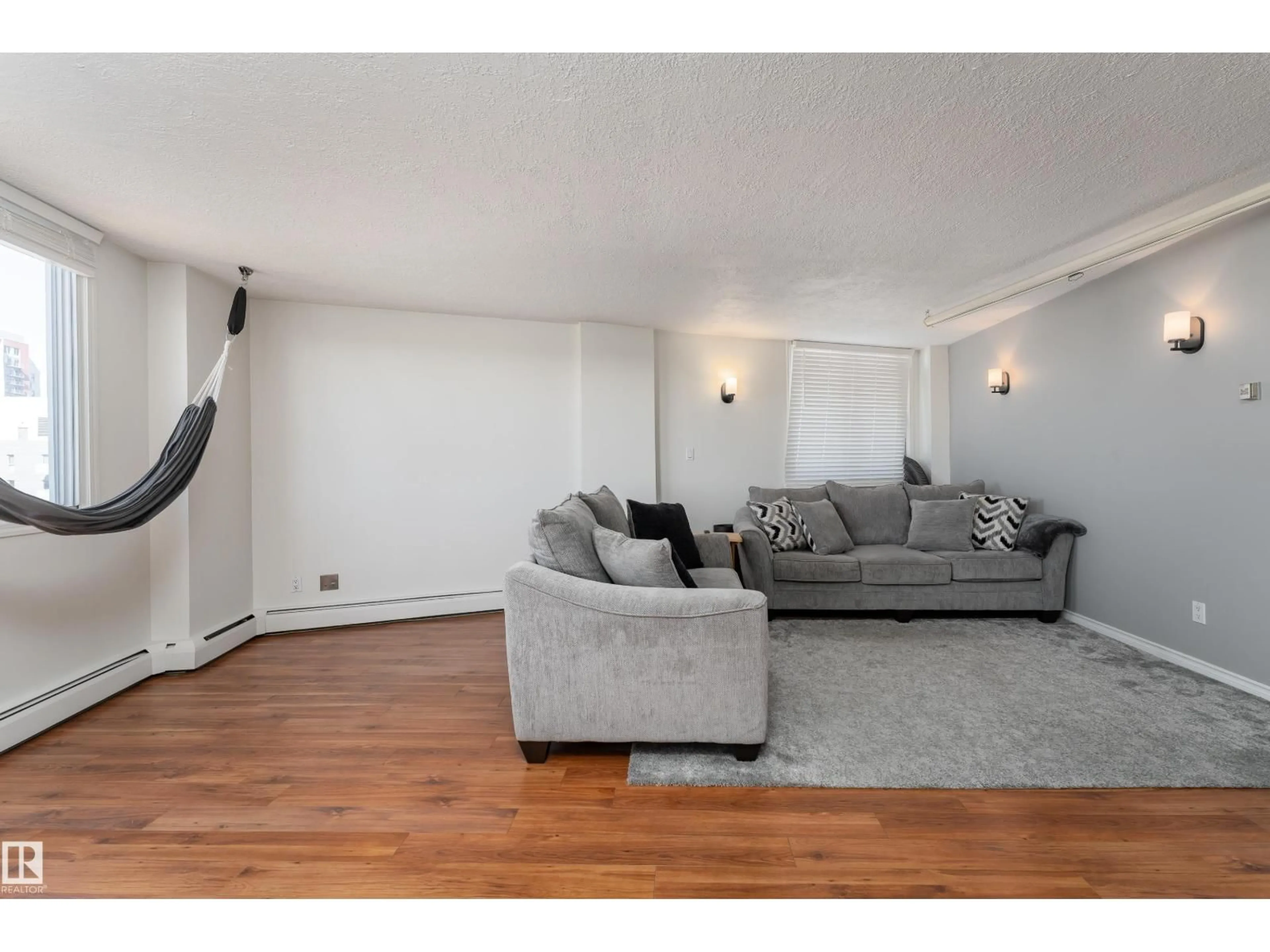 Living room with furniture, unknown for #1601 - 12141 JASPER AV, Edmonton Alberta T5N3X8