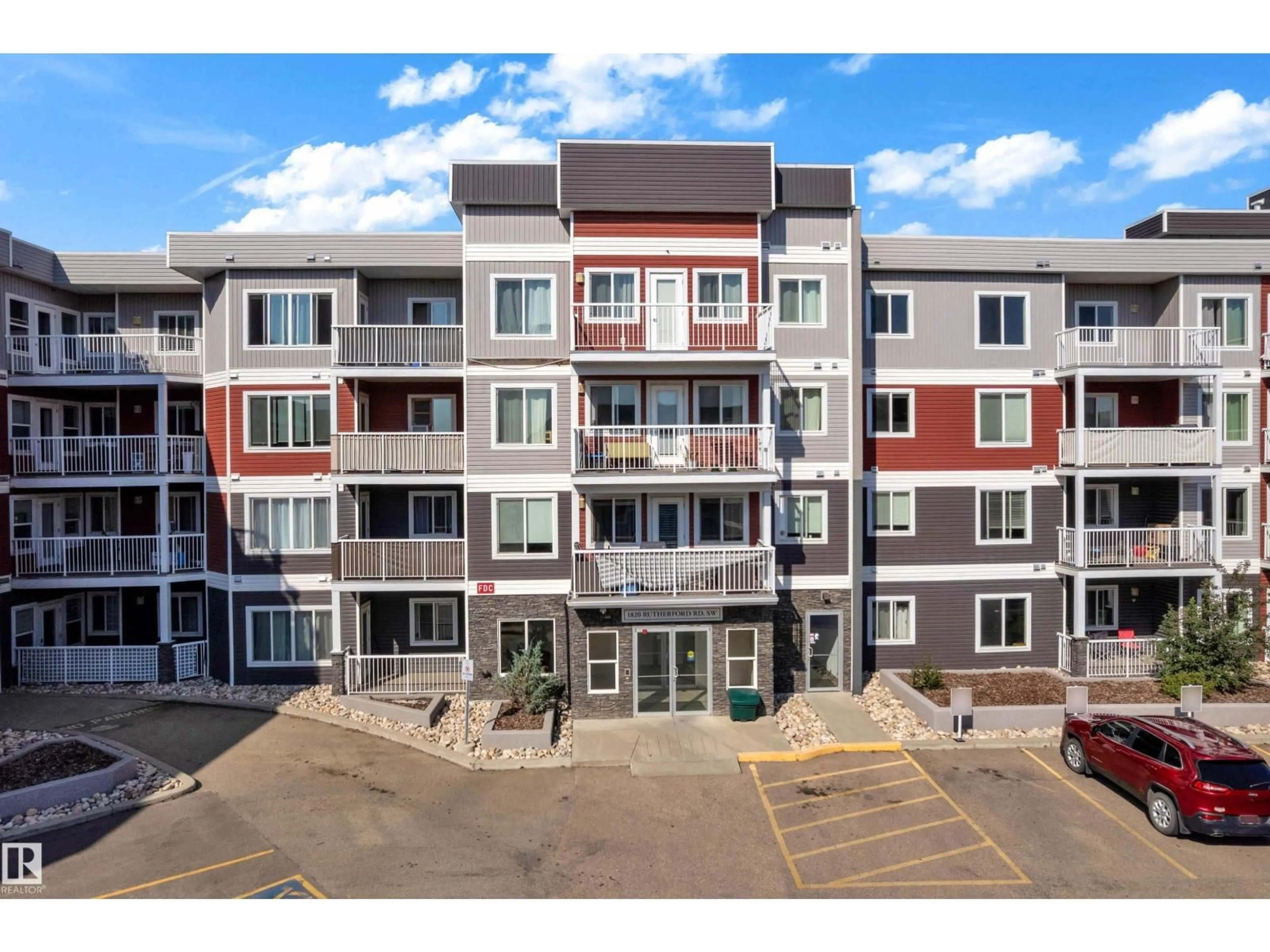 A pic from outside/outdoor area/front of a property/back of a property/a pic from drone, building for #110 - 1820 RUTHERFORD RD, Edmonton Alberta T6W2K6
