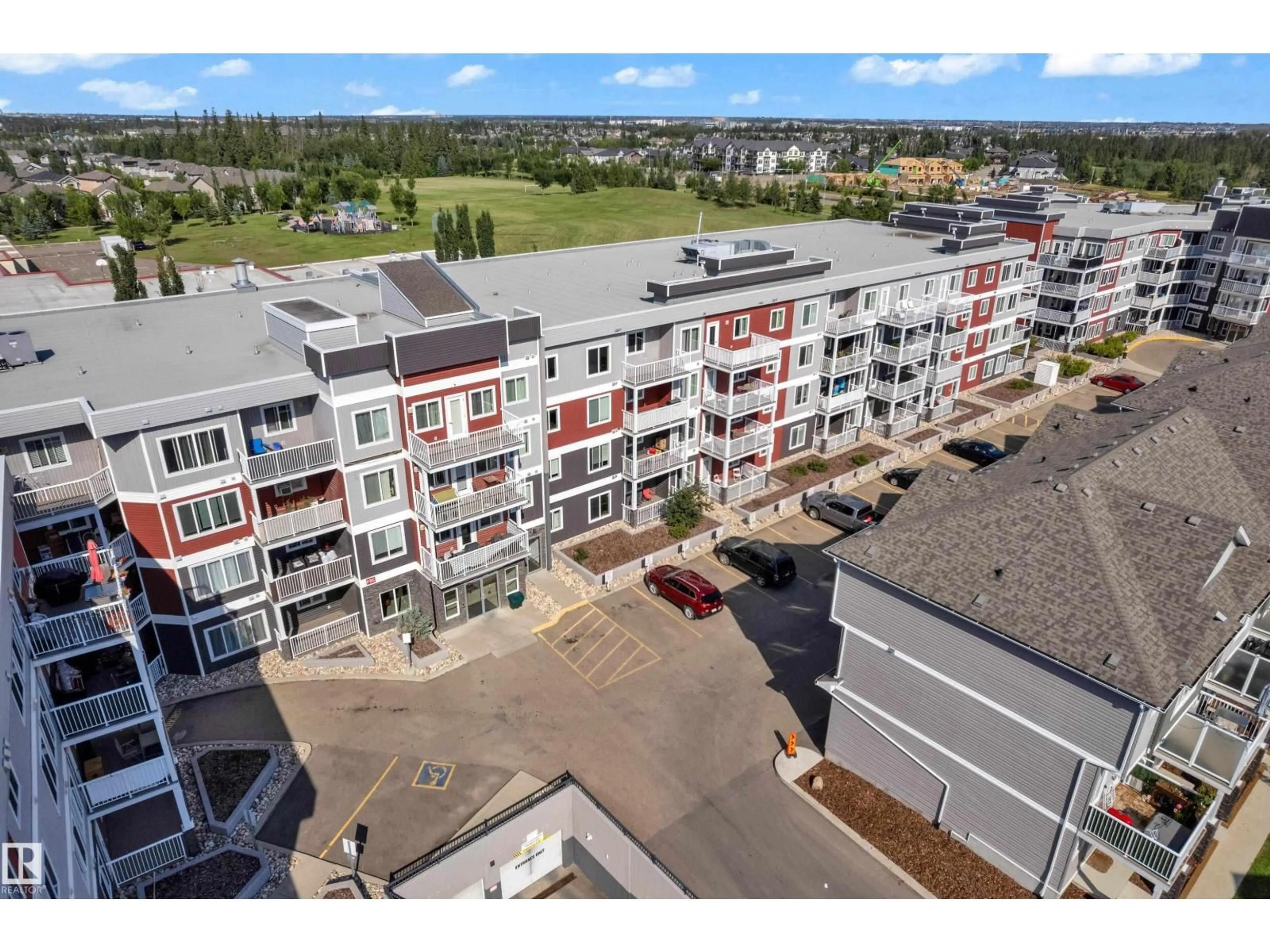 A pic from outside/outdoor area/front of a property/back of a property/a pic from drone, city buildings view from balcony for #110 - 1820 RUTHERFORD RD, Edmonton Alberta T6W2K6