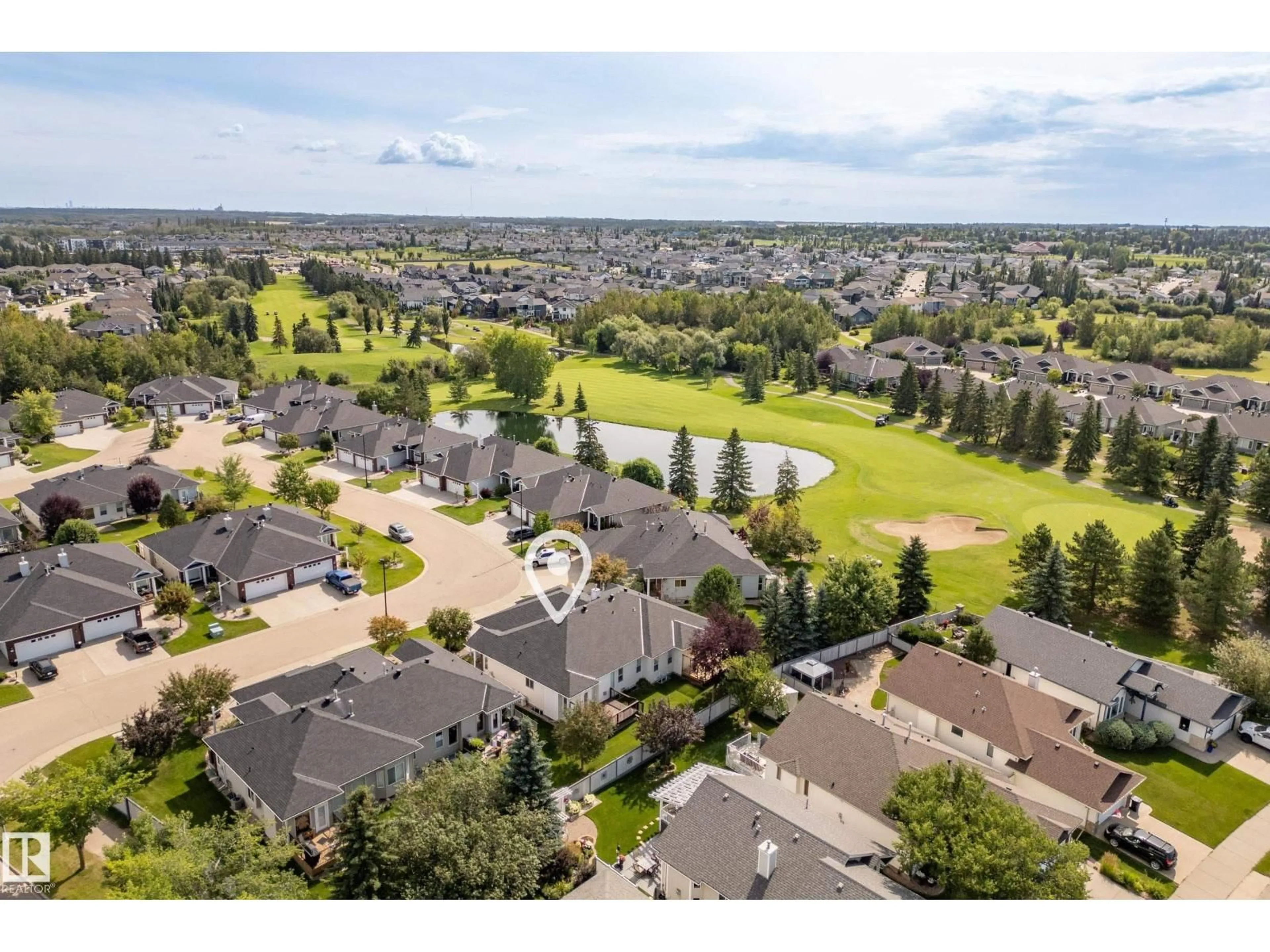 A pic from outside/outdoor area/front of a property/back of a property/a pic from drone, water/lake/river/ocean view for 5 LONGVIEW CR, Spruce Grove Alberta T7X3M6
