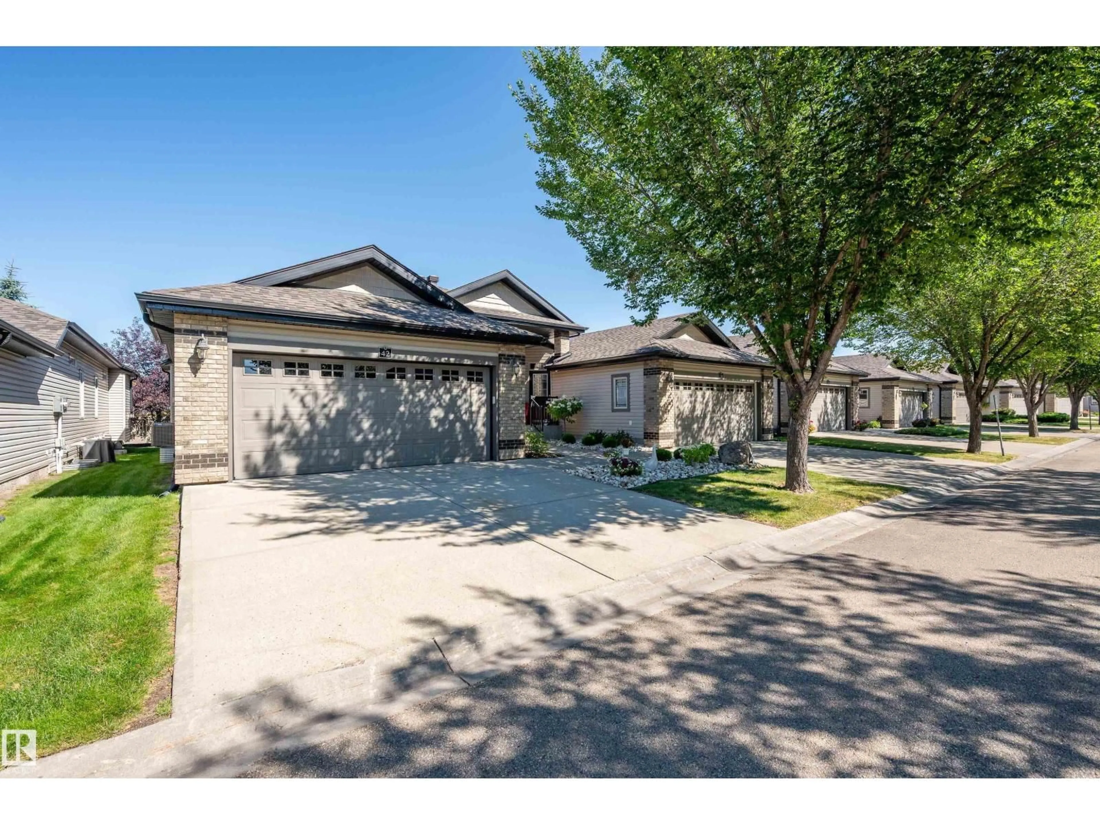 A pic from outside/outdoor area/front of a property/back of a property/a pic from drone, street for 42 - 276 CRANFORD DR, Sherwood Park Alberta T8H0C6